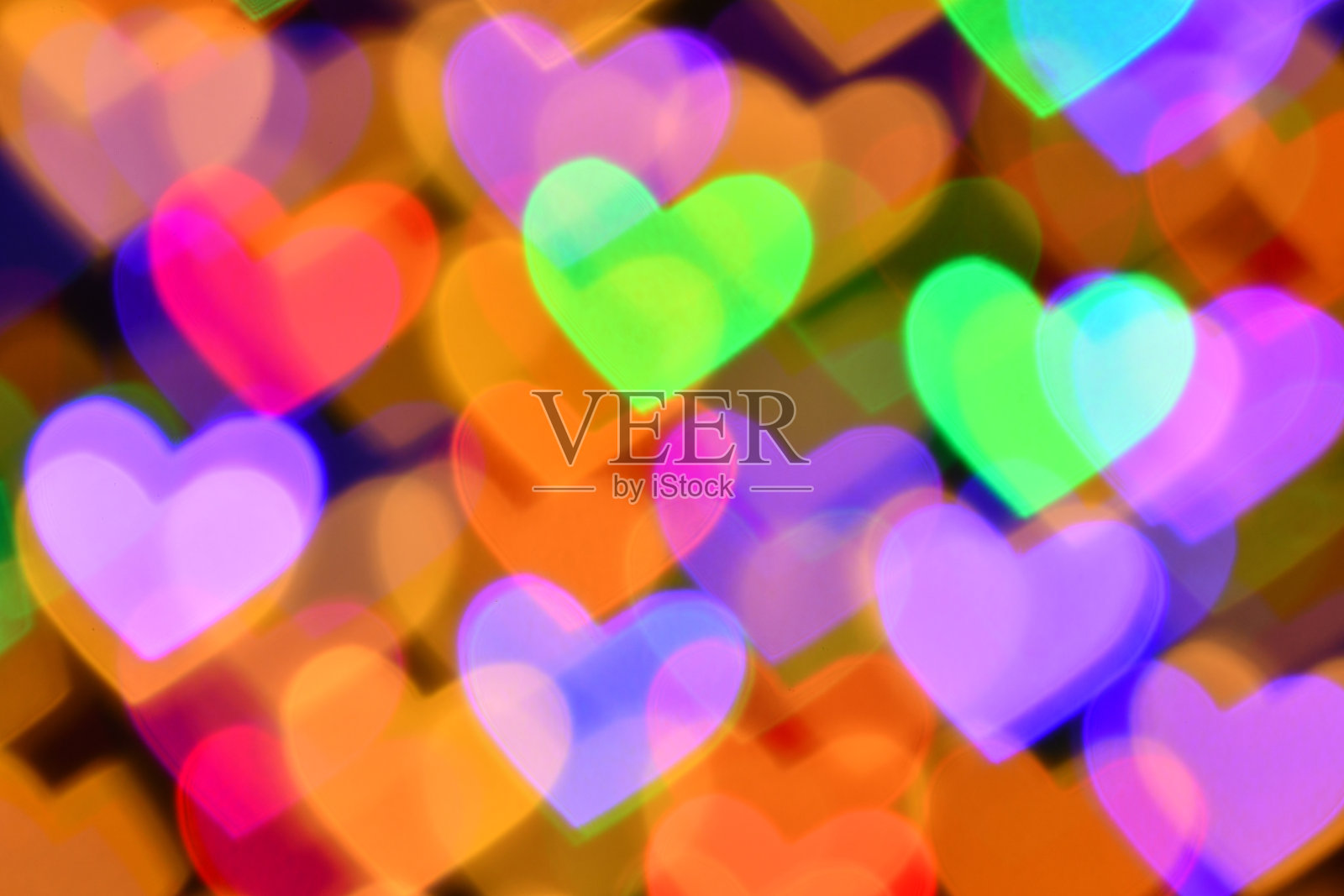 五彩缤纷的心形照明为节日或抽象的博克背景照片摄影图片