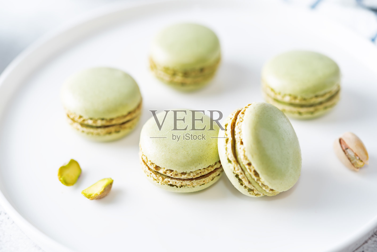 新鲜香甜的绿色开心果马卡龙照片摄影图片