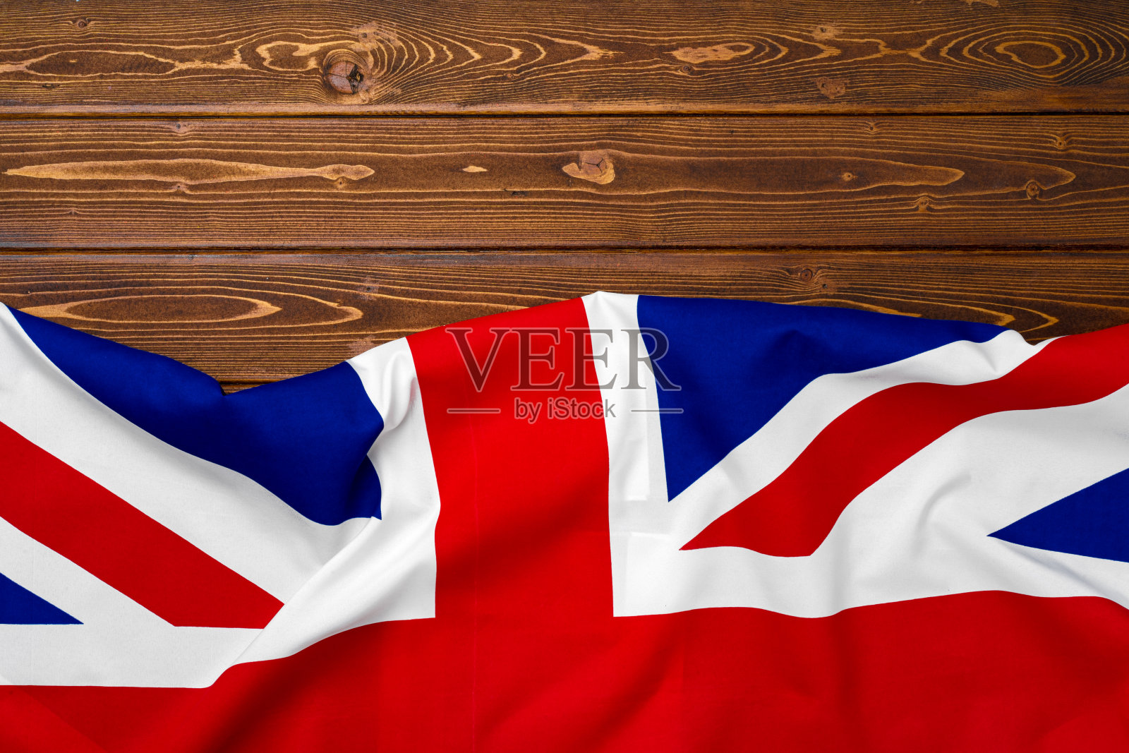 木制背景的英国国旗照片摄影图片