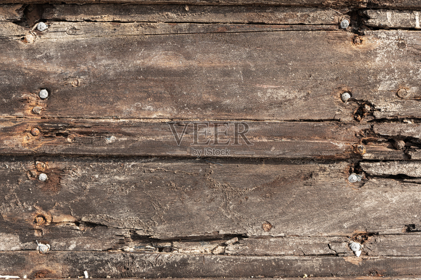 旧的裂开的木头的纹理。古老的木栅栏。敲定照片摄影图片