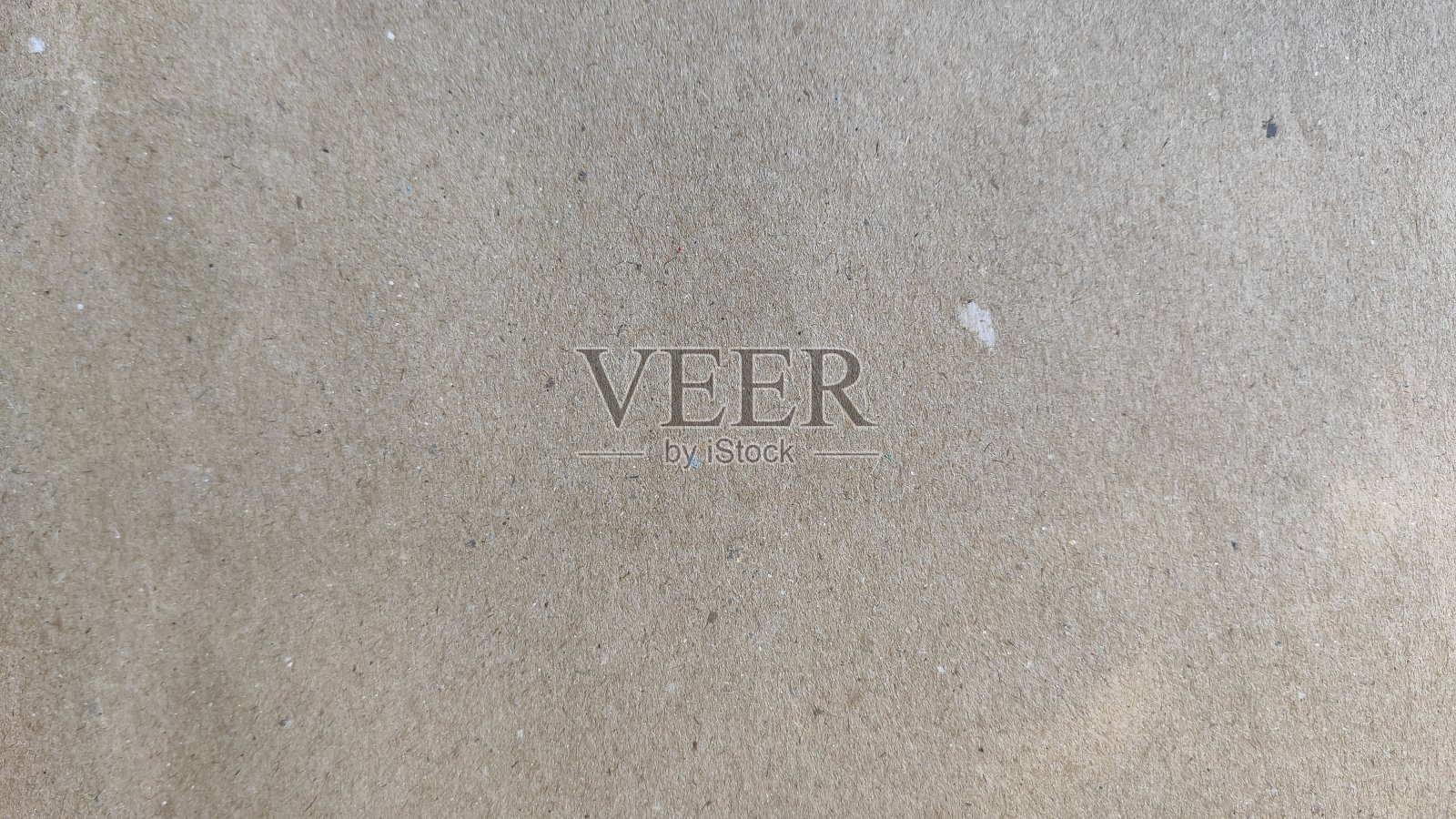 有小斑点的旧棕色纸的纹理照片摄影图片