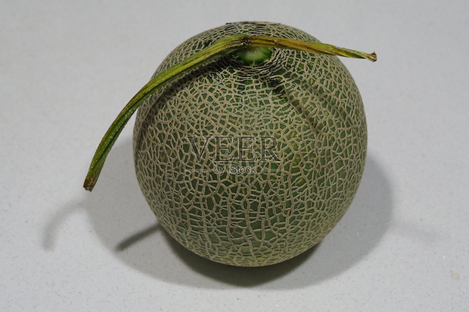 桌上放着日本瓜照片摄影图片