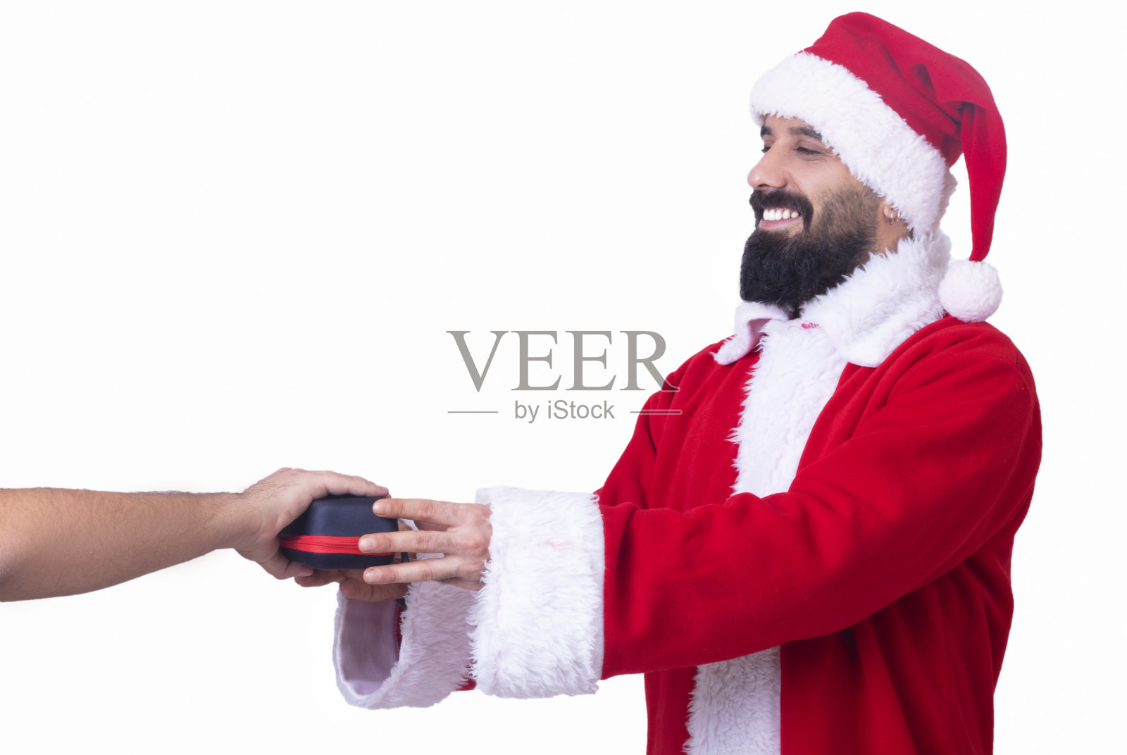 圣诞老人赠送礼物。照片摄影图片