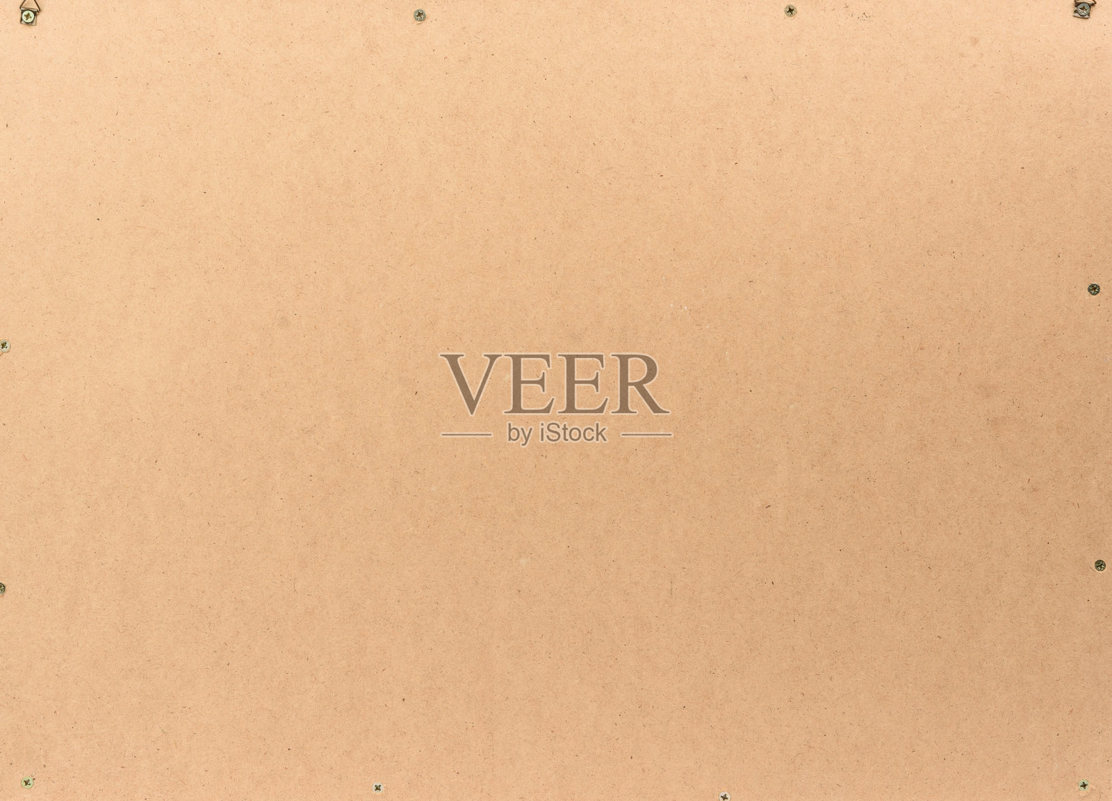 带螺丝的棕色胶合板，全框照片摄影图片