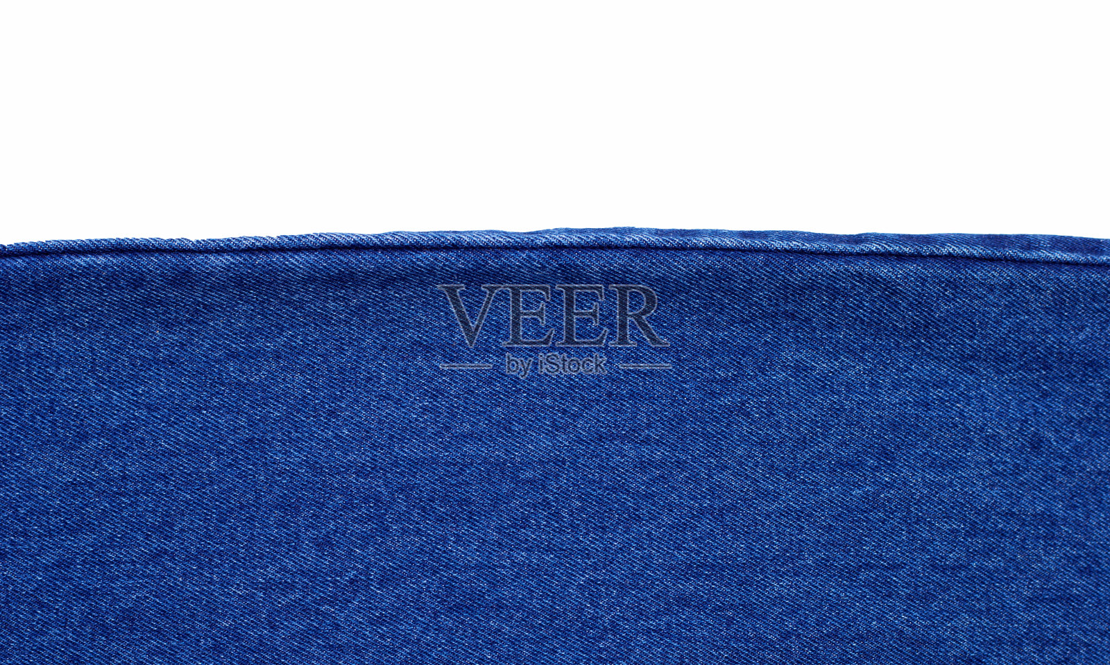 近距离蓝色牛仔裤纹理背景。照片摄影图片