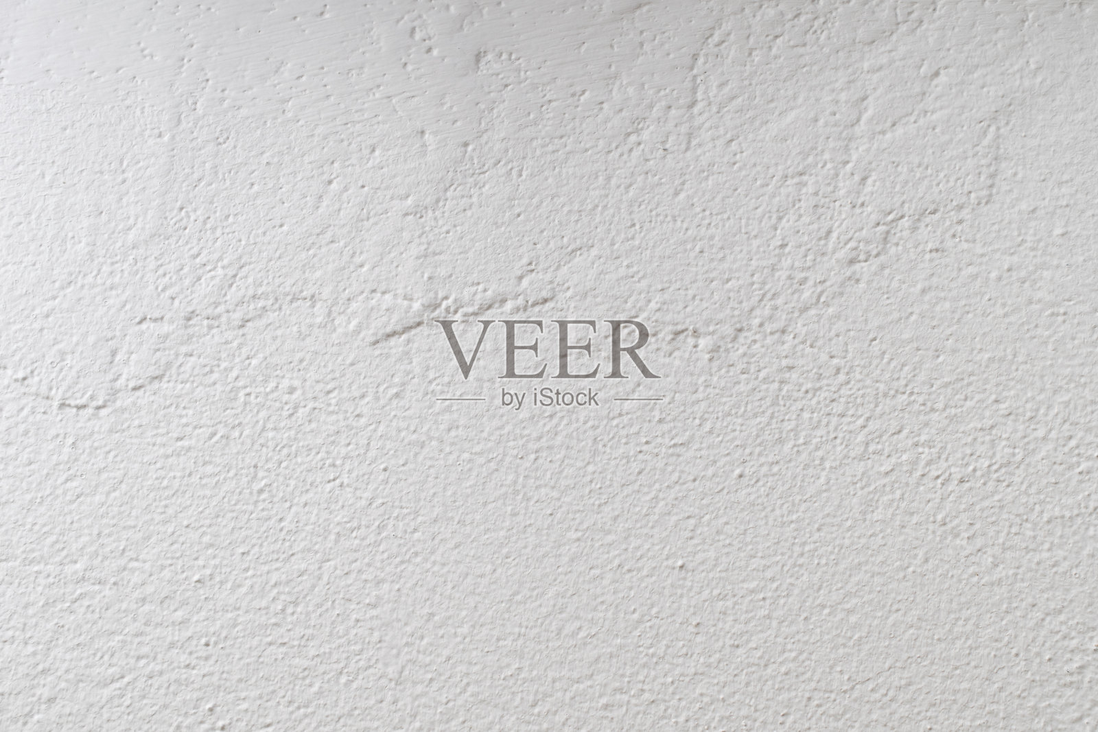 墙是用白色油漆涂的，有明显的纹理照片摄影图片