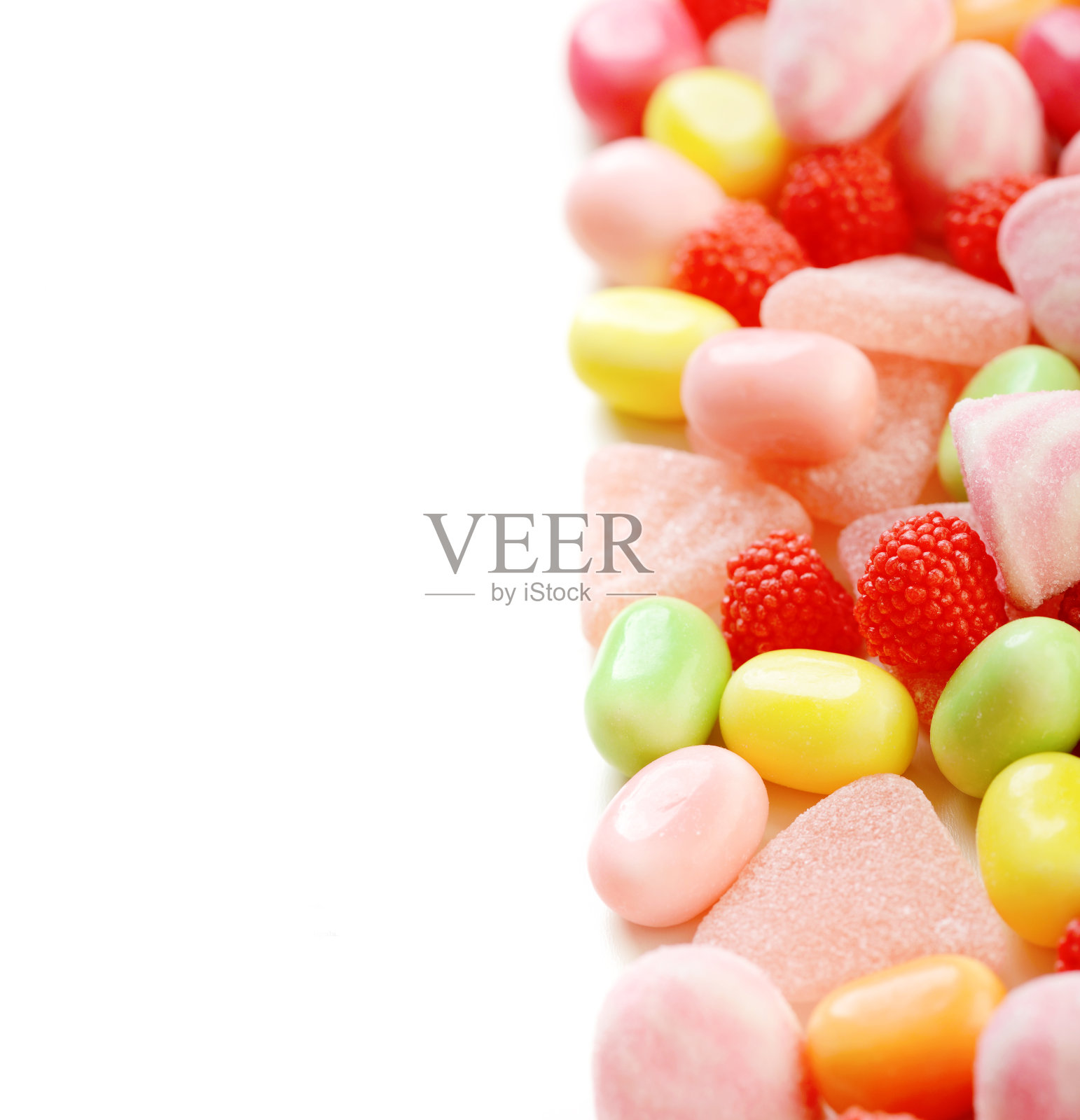 明亮美丽的糖果在白色的背景照片摄影图片