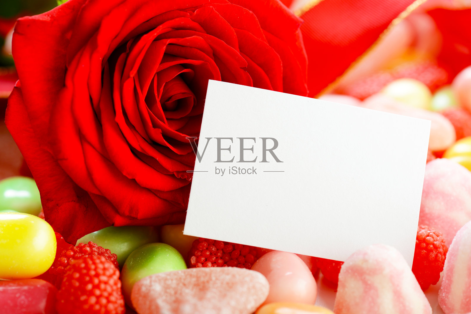 明亮美丽的糖果背景与花照片摄影图片