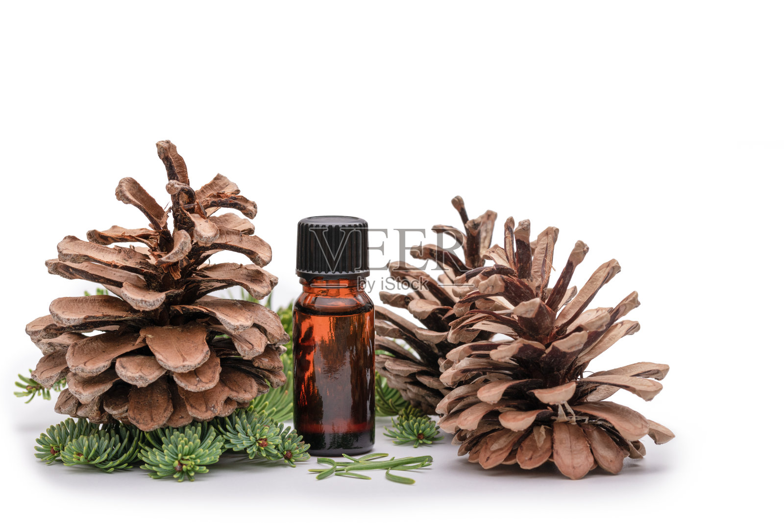 香薰油瓶与松木照片摄影图片