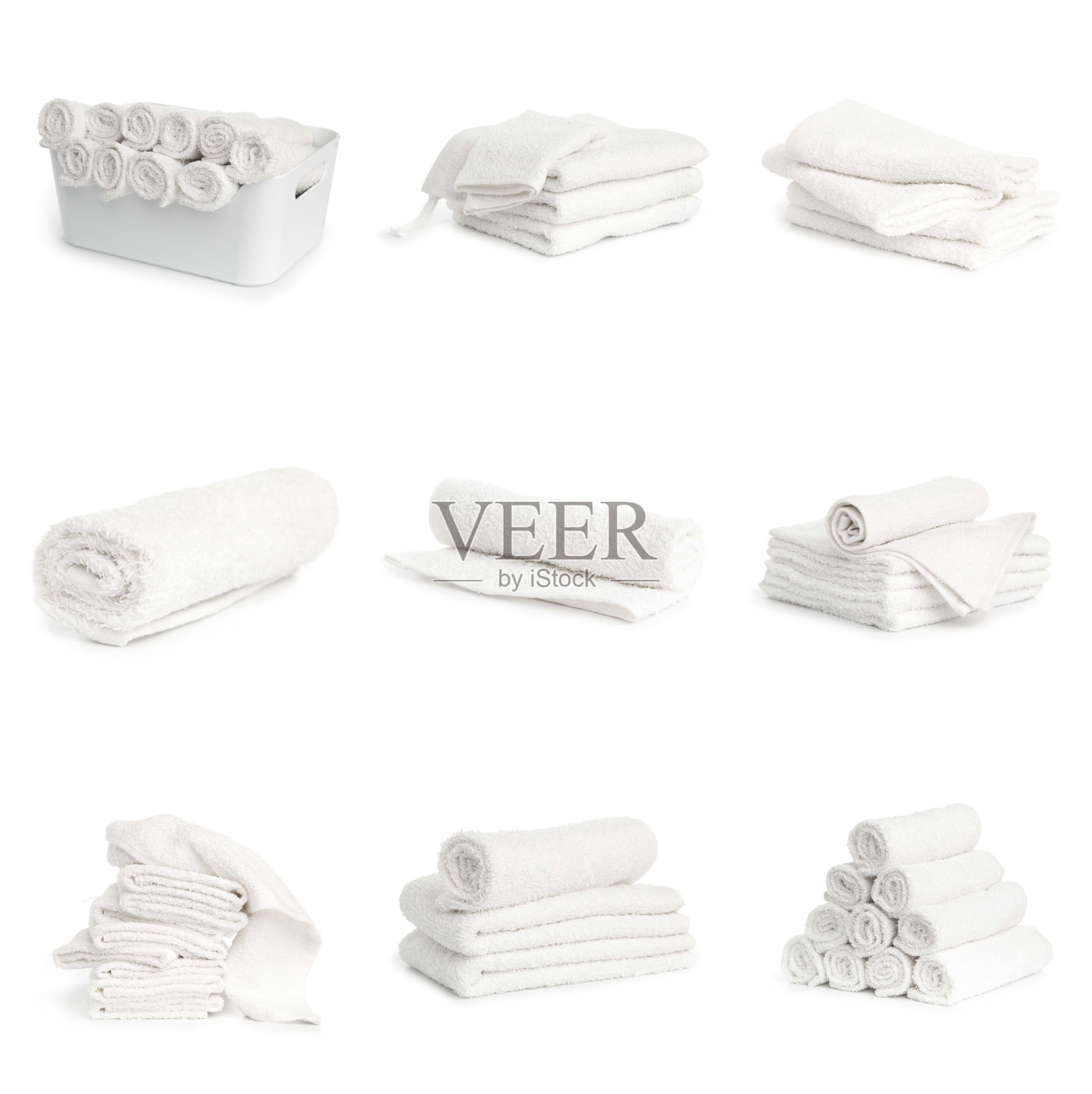 套白色水疗浴巾堆叠在篮子孤立在白色背景照片摄影图片