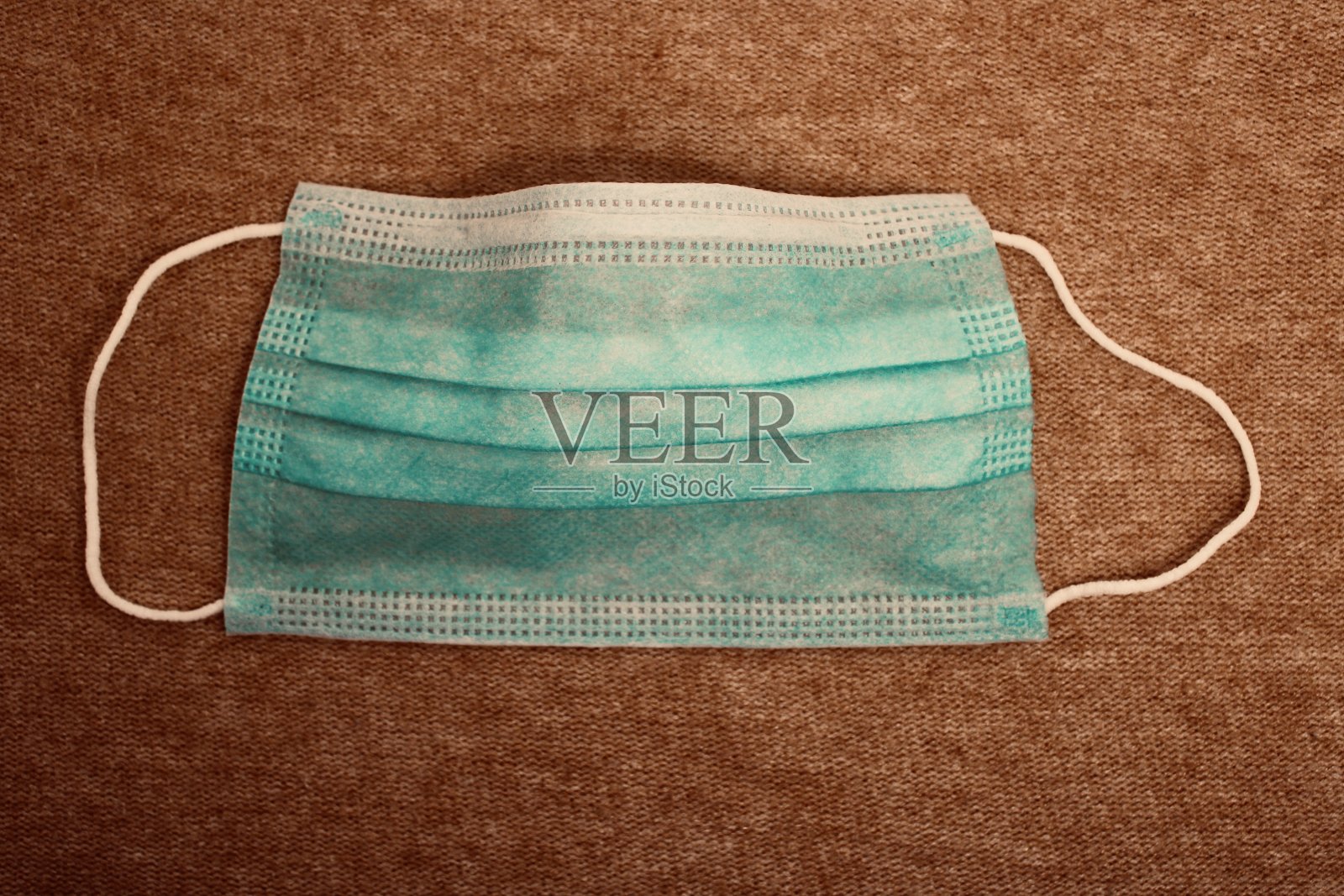 口罩在covid - 19期间用于防护的外科口罩照片摄影图片