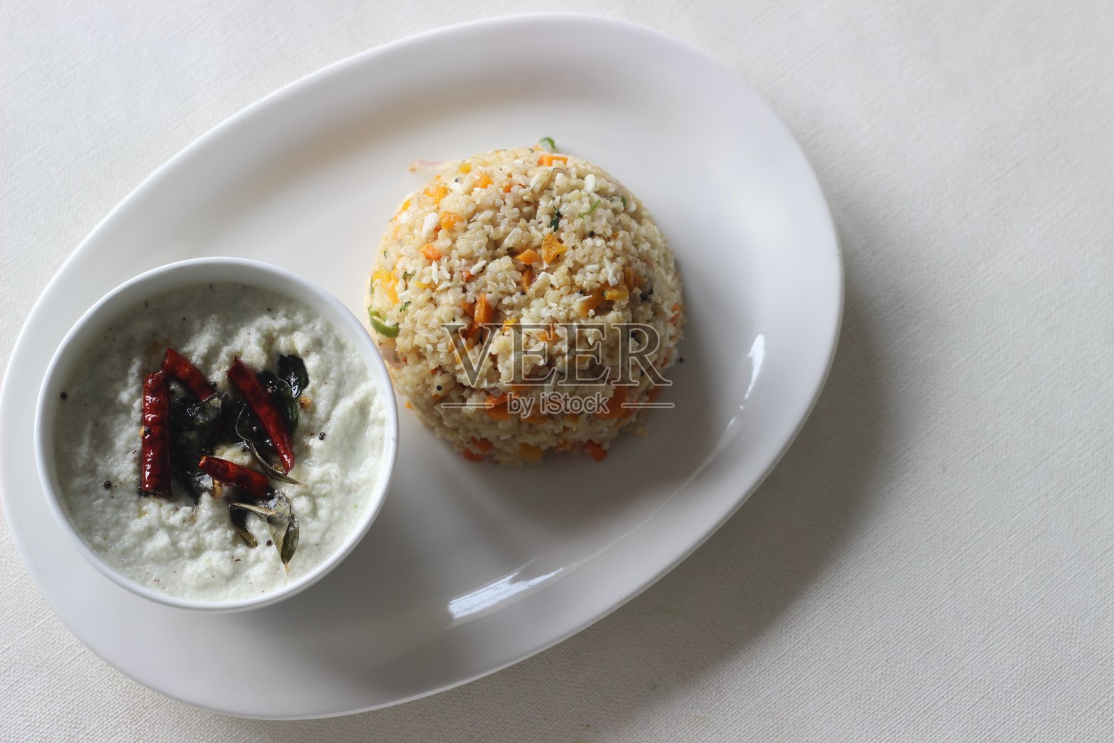 一种用碎麦做的南印度早餐，叫做upma照片摄影图片