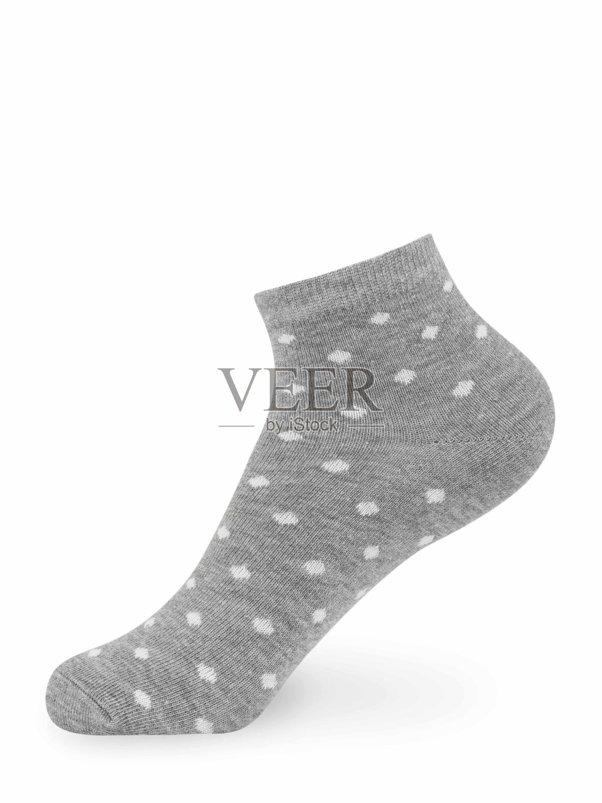 孤立的灰色圆点短袜上看不见的人体模型脚上的白色背景，侧视图照片摄影图片