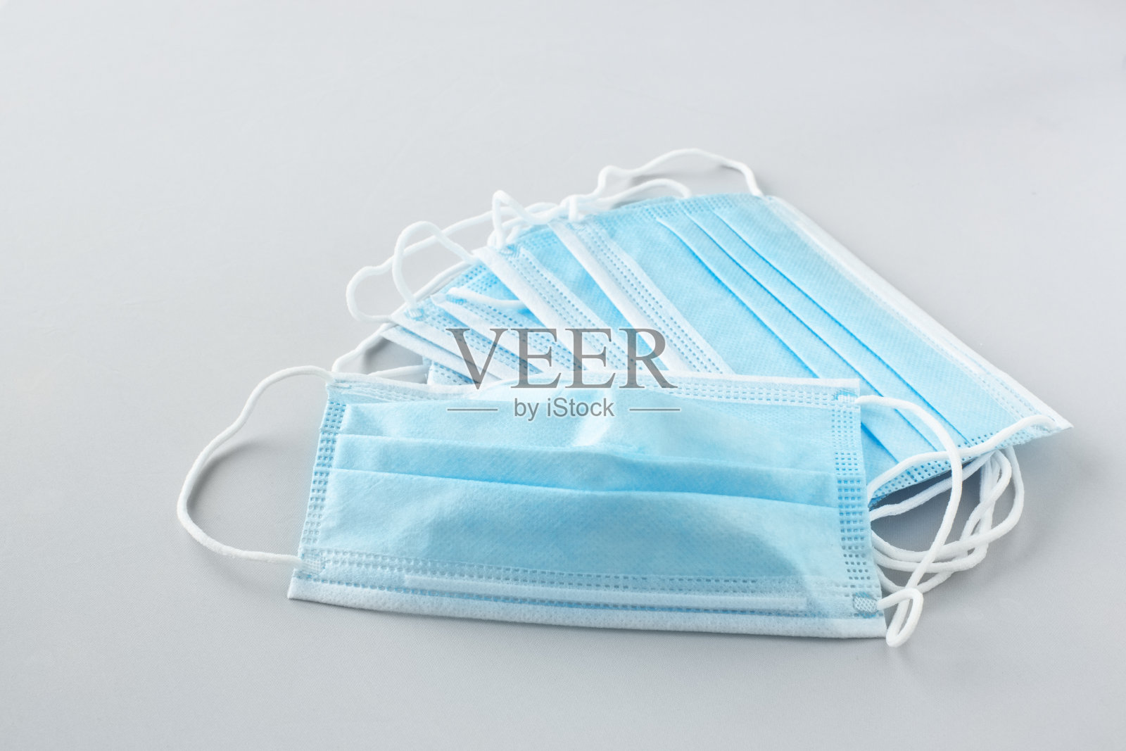 一堆蓝色防护面具照片摄影图片