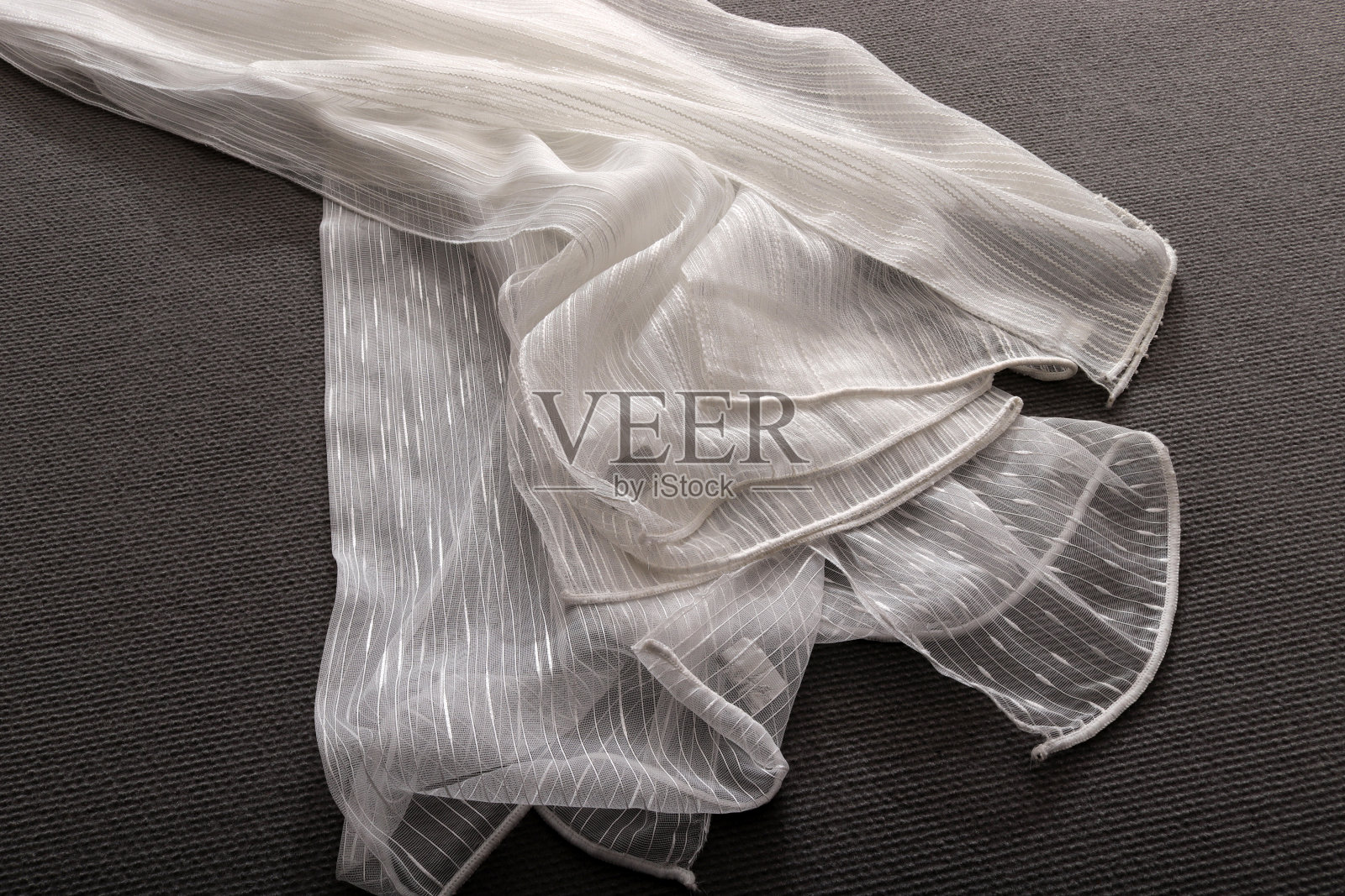 优雅的薄纱窗帘。家居装饰。照片摄影图片