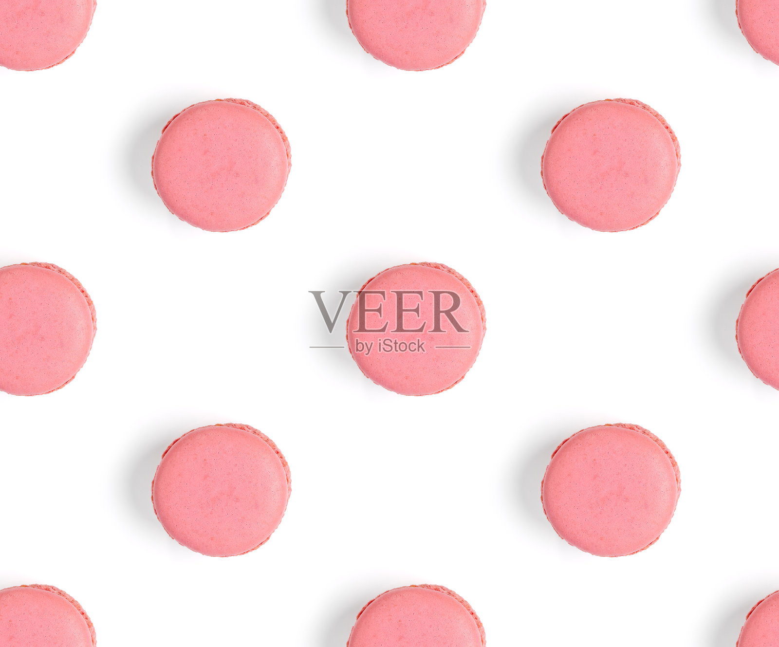 马卡龙无缝模式。孤立在白色背景上的马卡龙。照片摄影图片