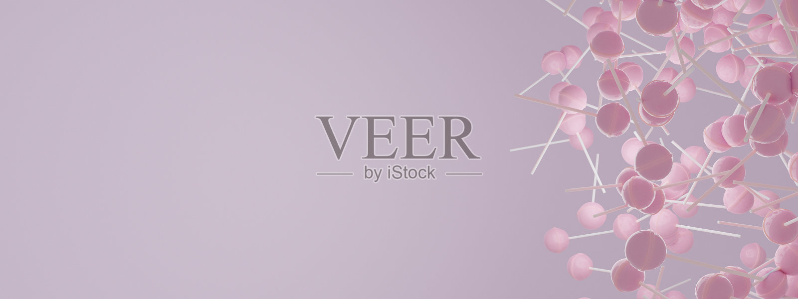 明亮的粉红色背景与许多草莓棒棒糖下落照片摄影图片