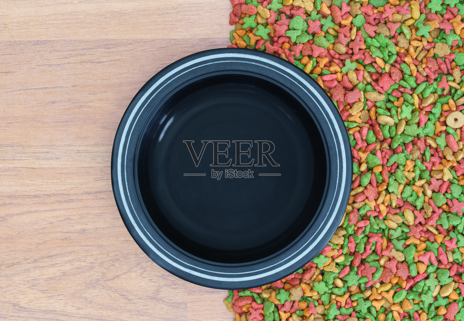 干猫粮和空碗照片摄影图片