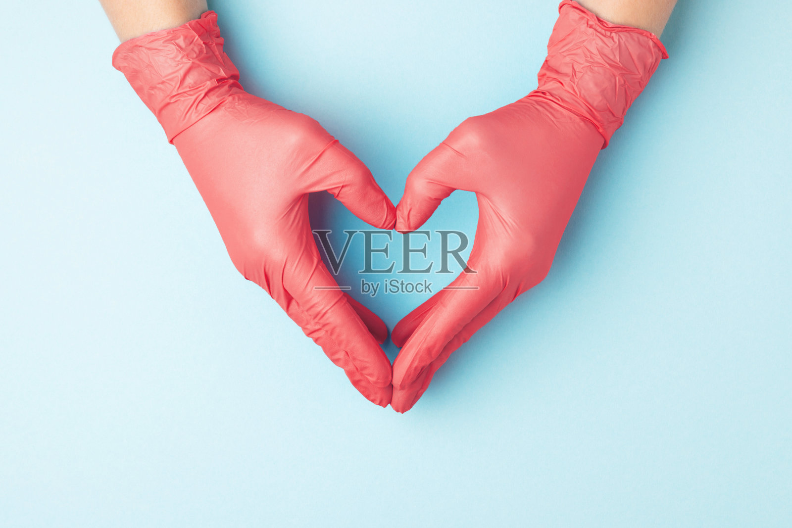 手戴医用手套。照片摄影图片