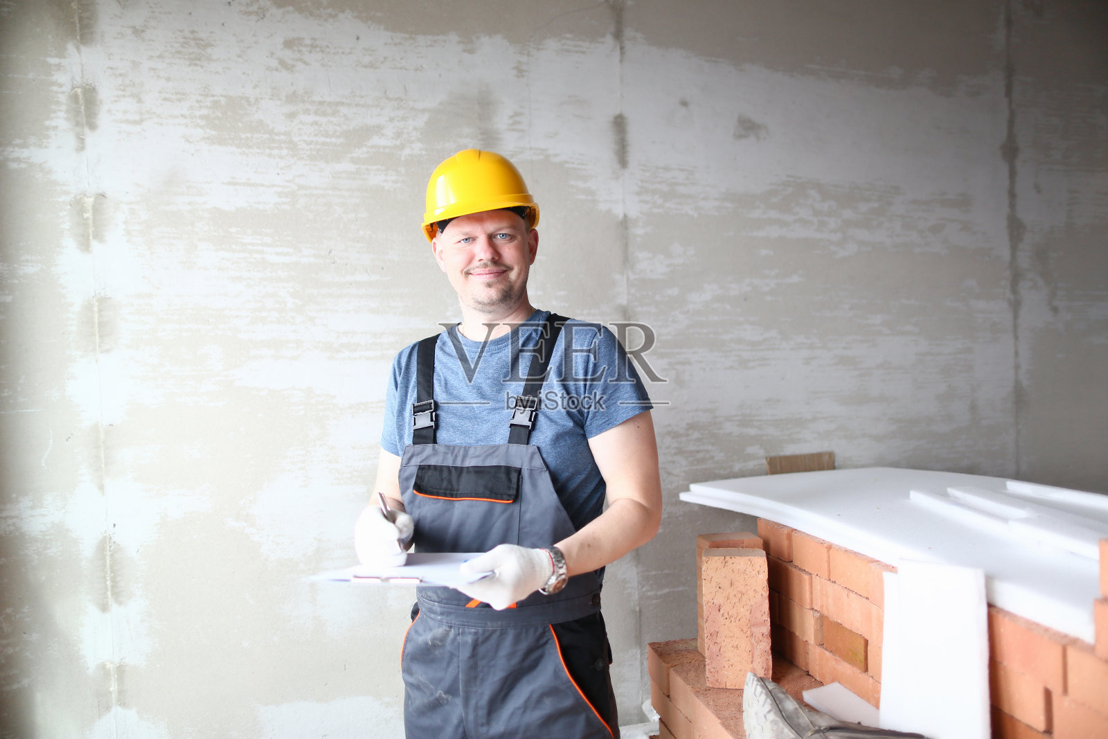 工作场所快乐的建设者照片摄影图片