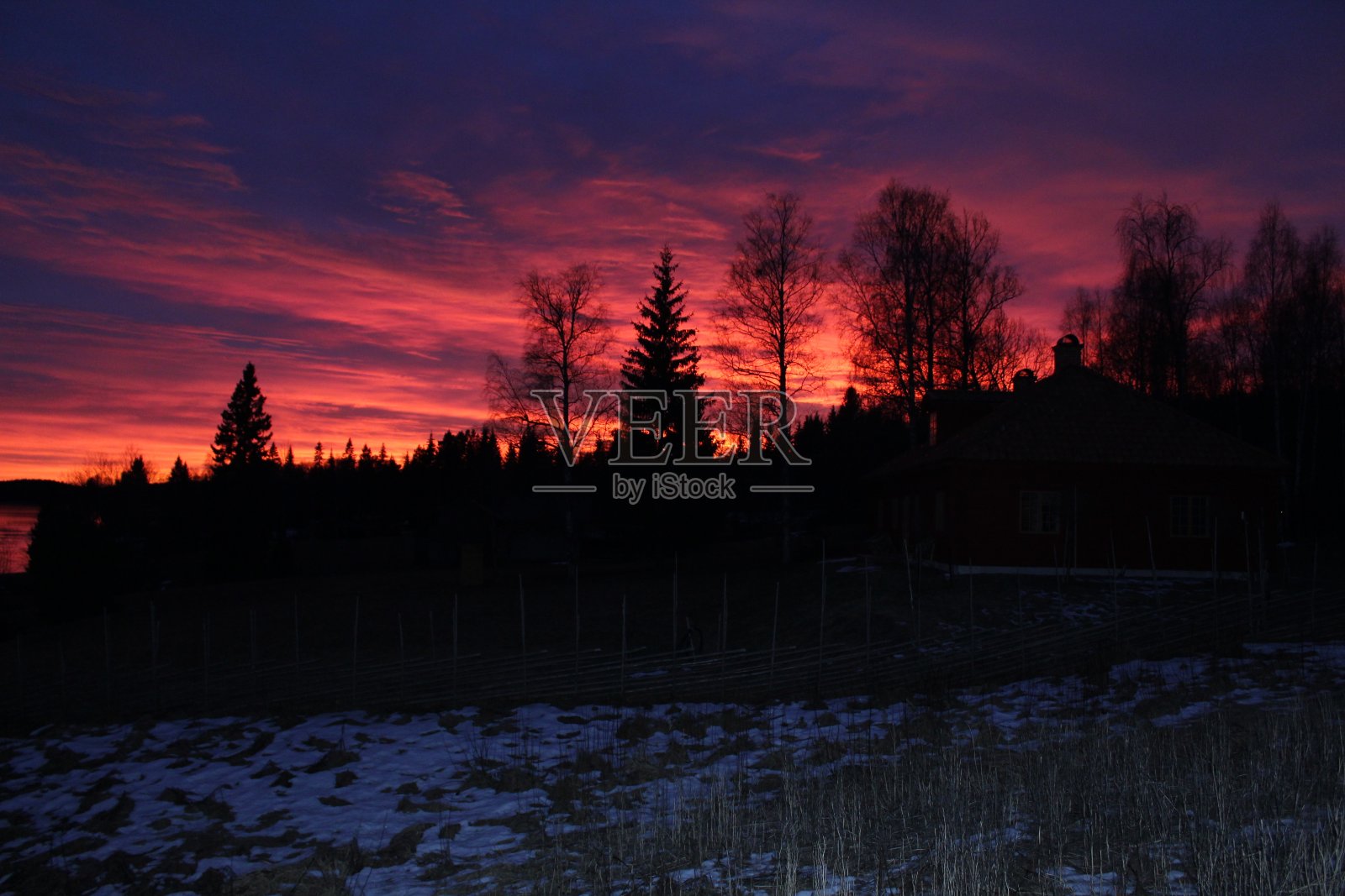 瑞典达拉那冬季的日落照片摄影图片