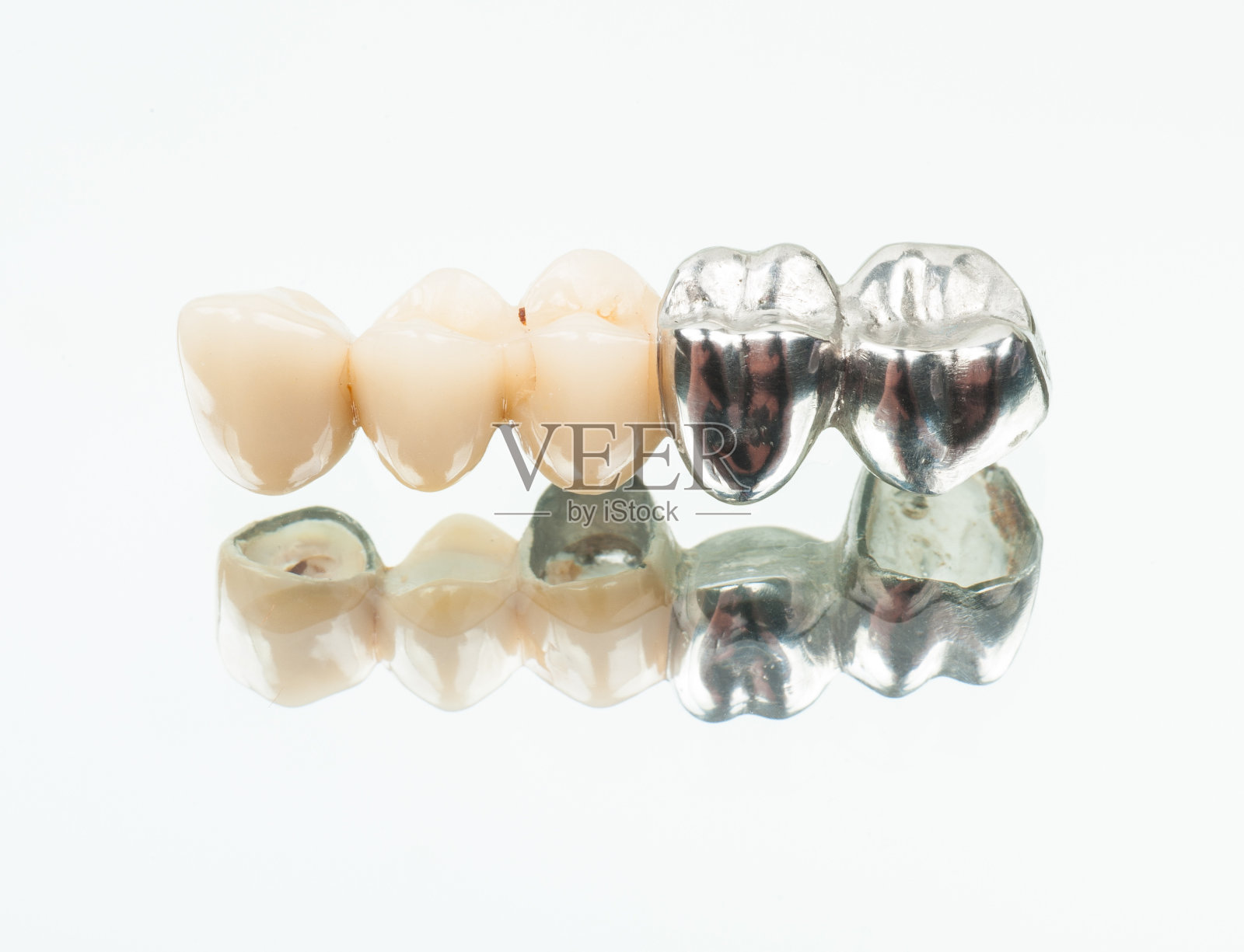 陶瓷牙冠和金属针特写白色照片摄影图片