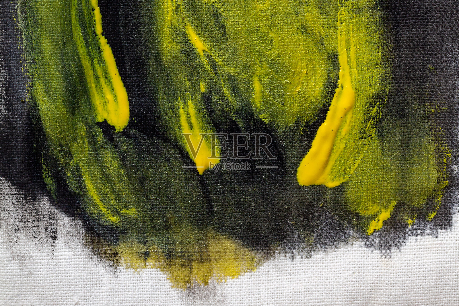用黑色和黄色颜料做的浅帆布照片摄影图片