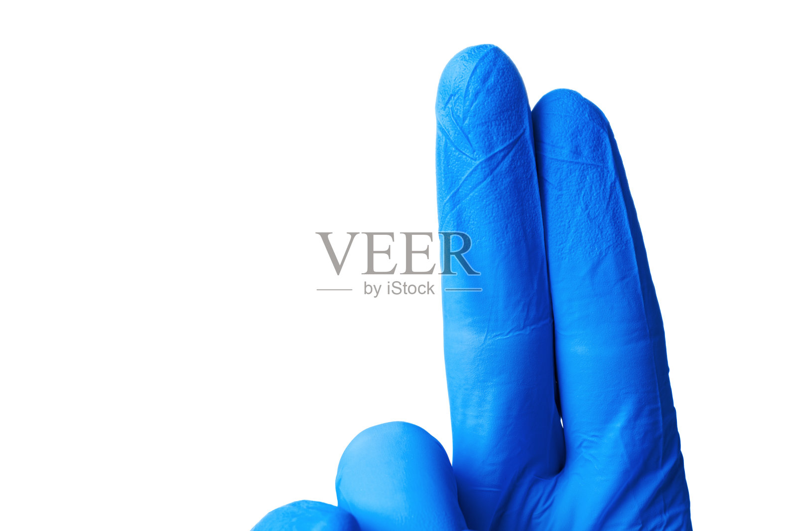 手放在蓝色医用手套上隔离白色照片摄影图片