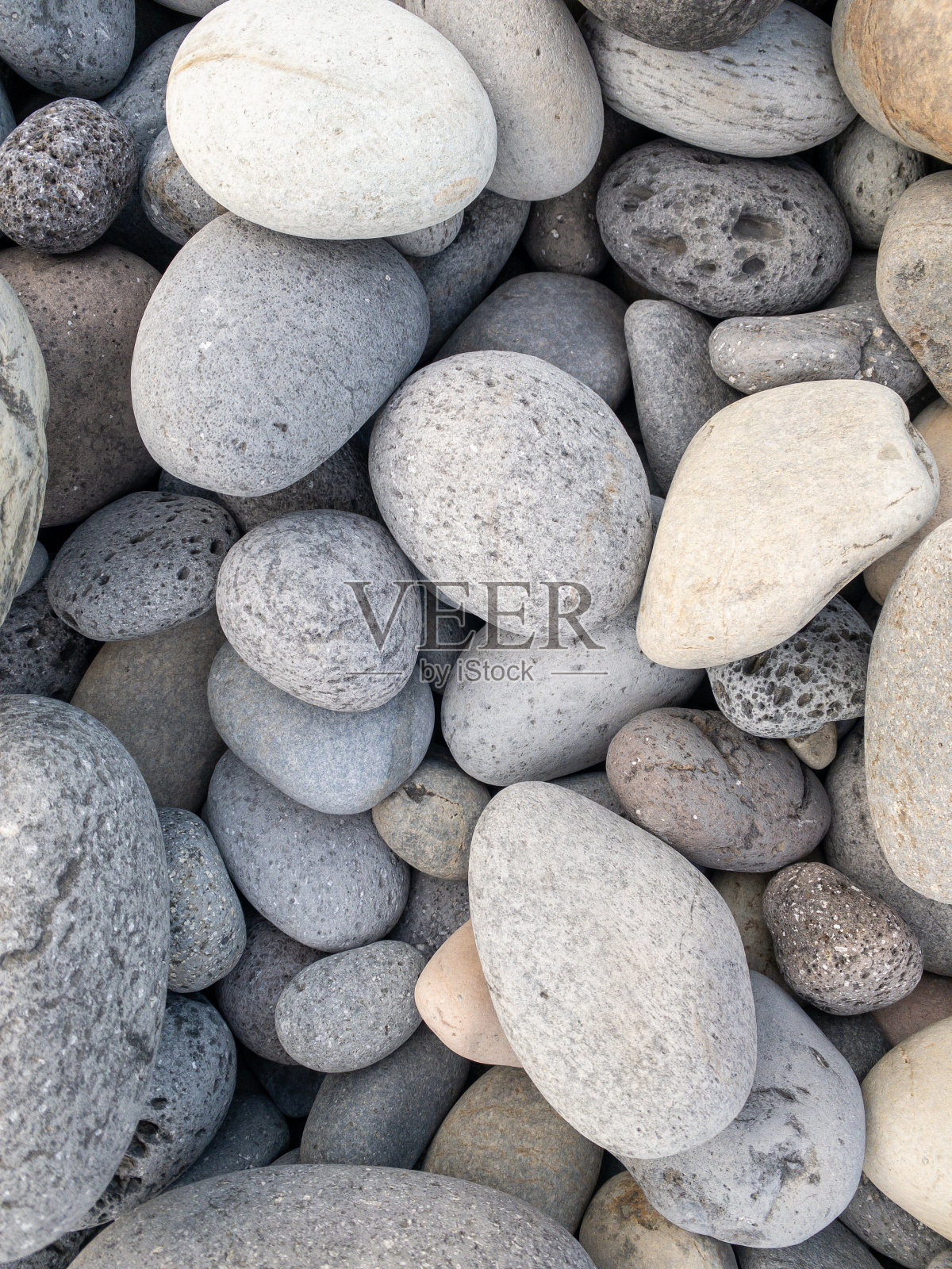 留尼旺岛东海岸不同颜色的鹅卵石照片摄影图片