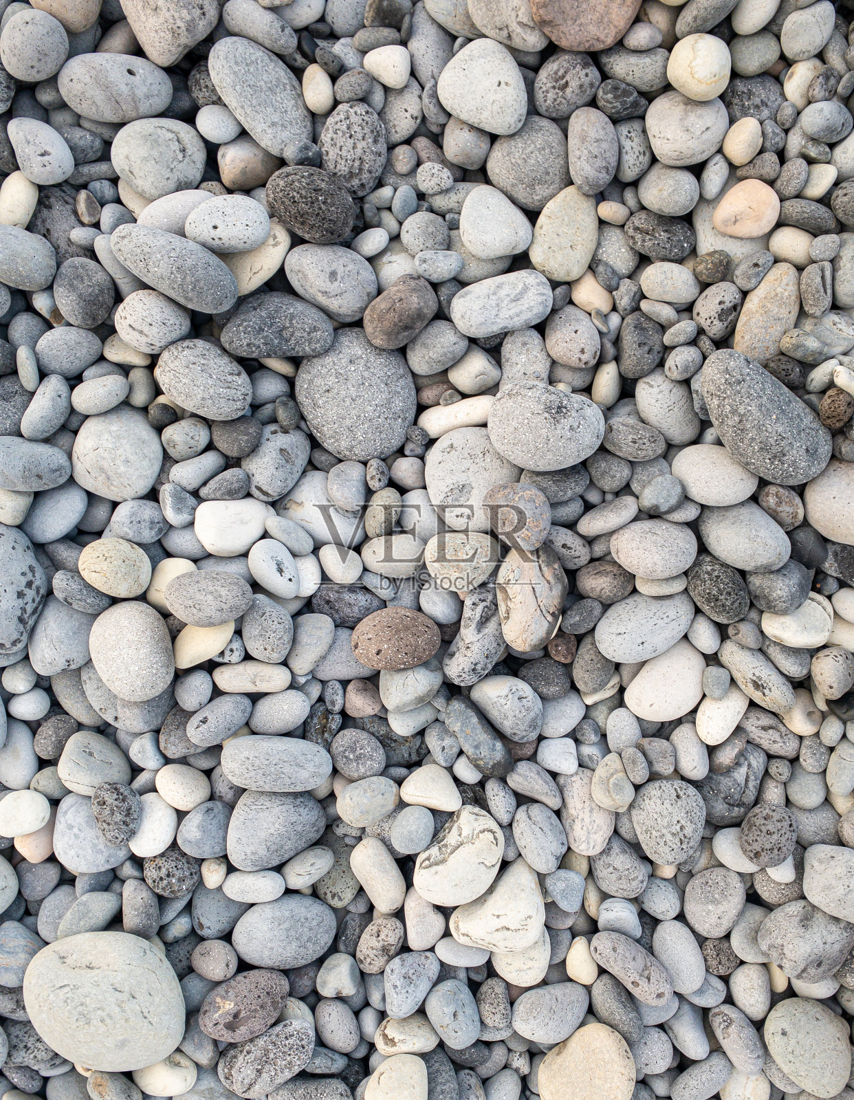 留尼旺岛东海岸不同颜色的鹅卵石照片摄影图片