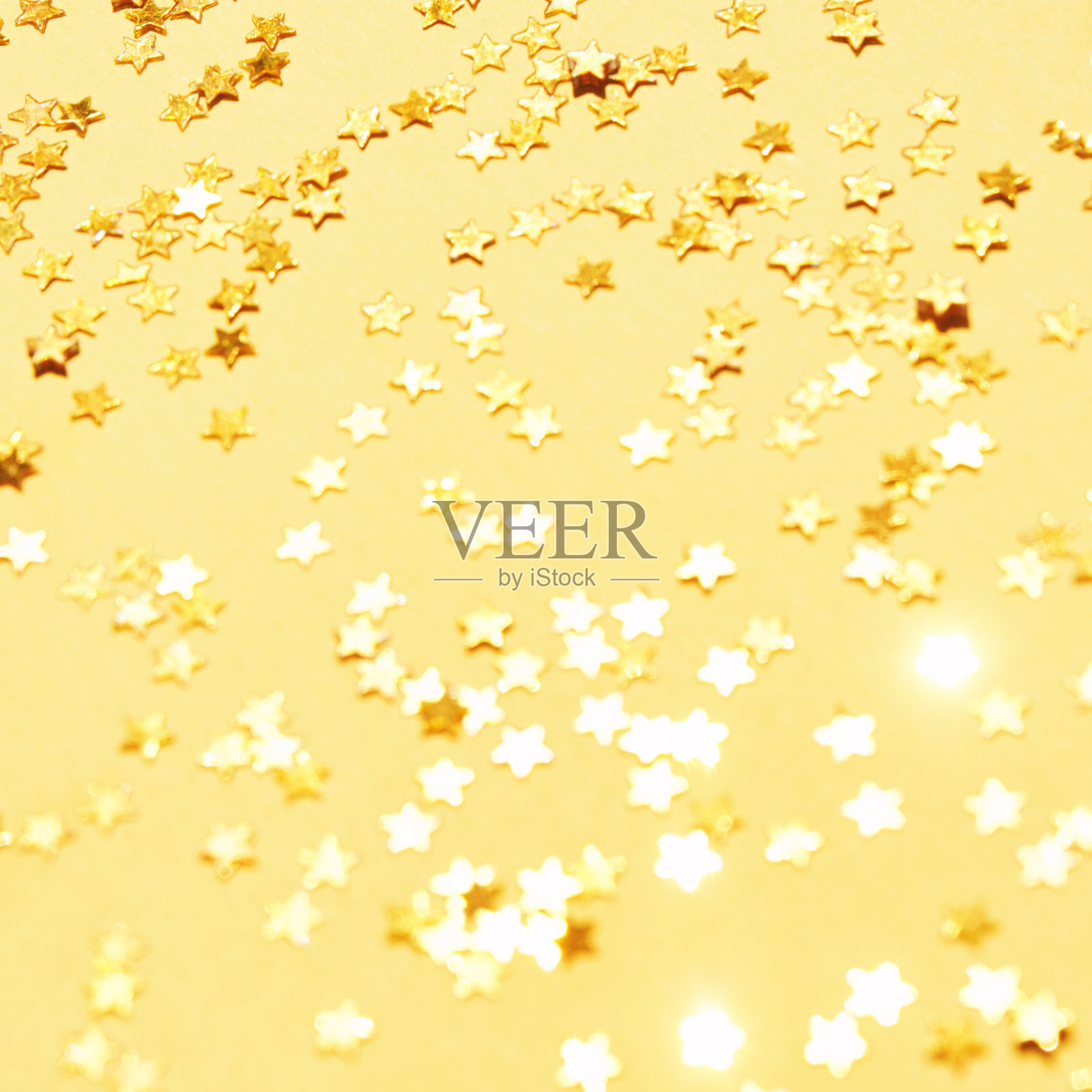 金星背景。黄色闪光背景。新年奢侈雪照片摄影图片