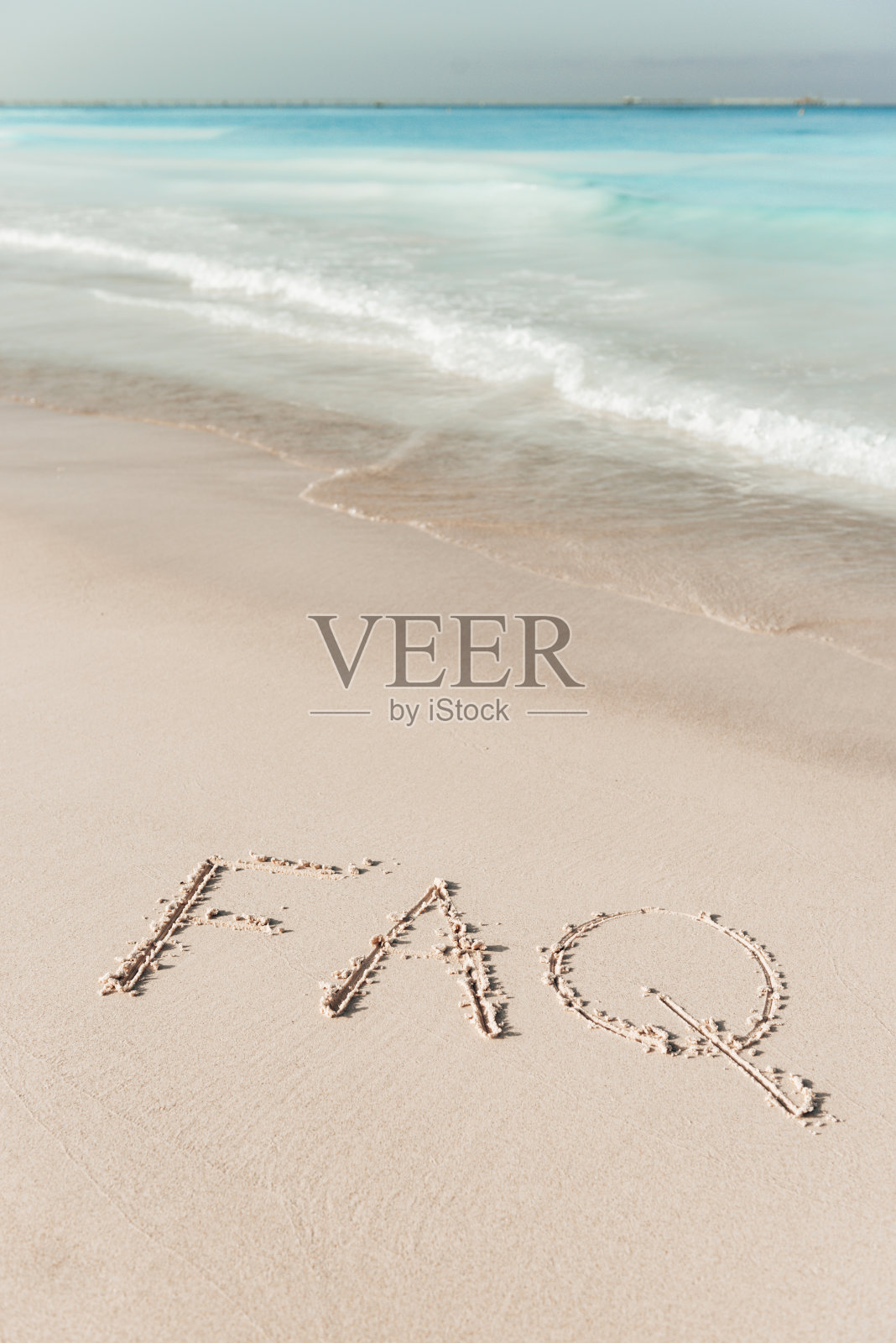 沙滩上的常见问题解答照片摄影图片