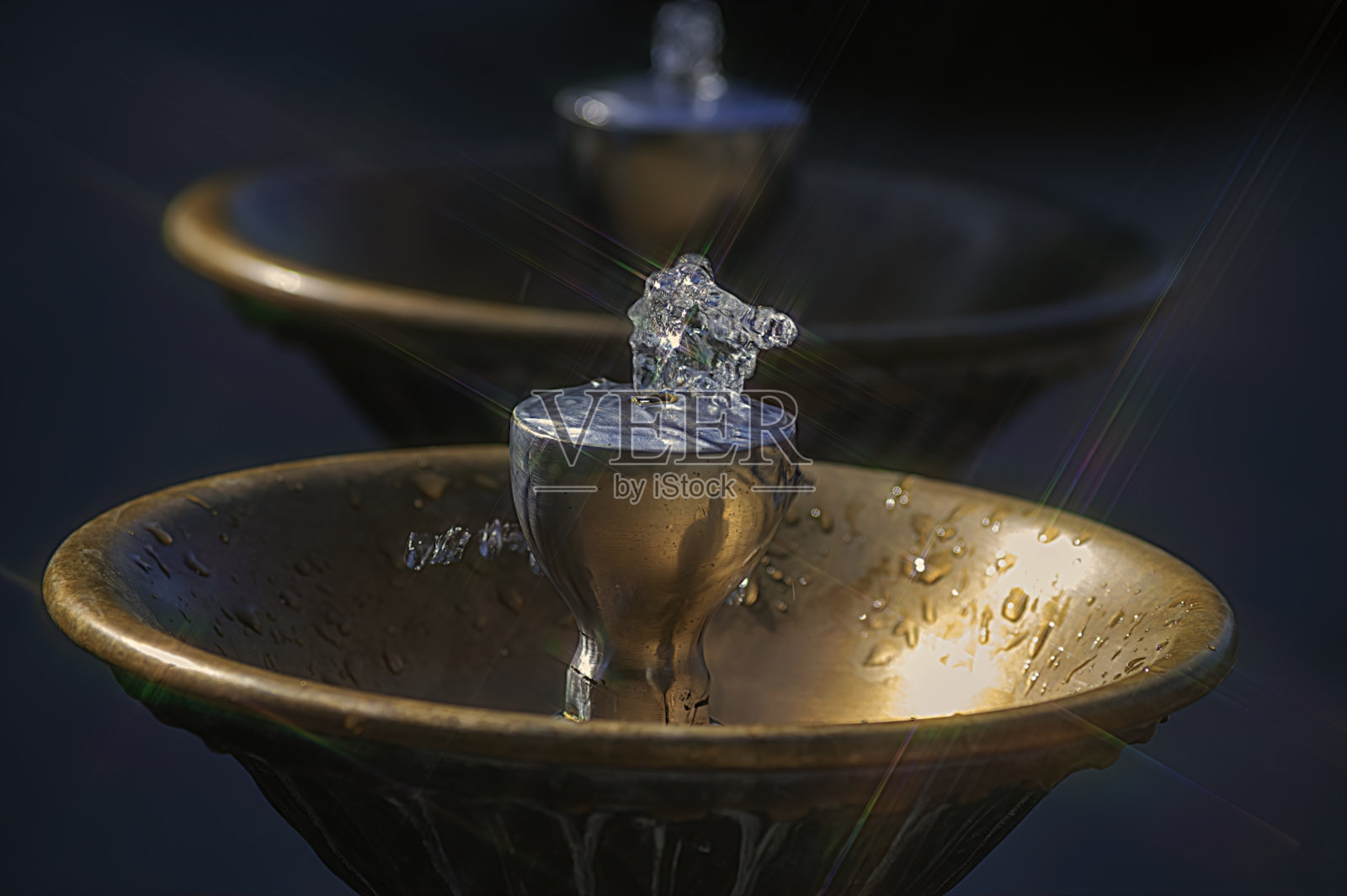 铜质喷泉的特写照片摄影图片