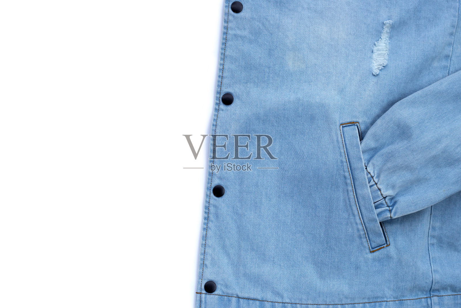 近距离的牛仔衬衫纹理为背景。照片摄影图片