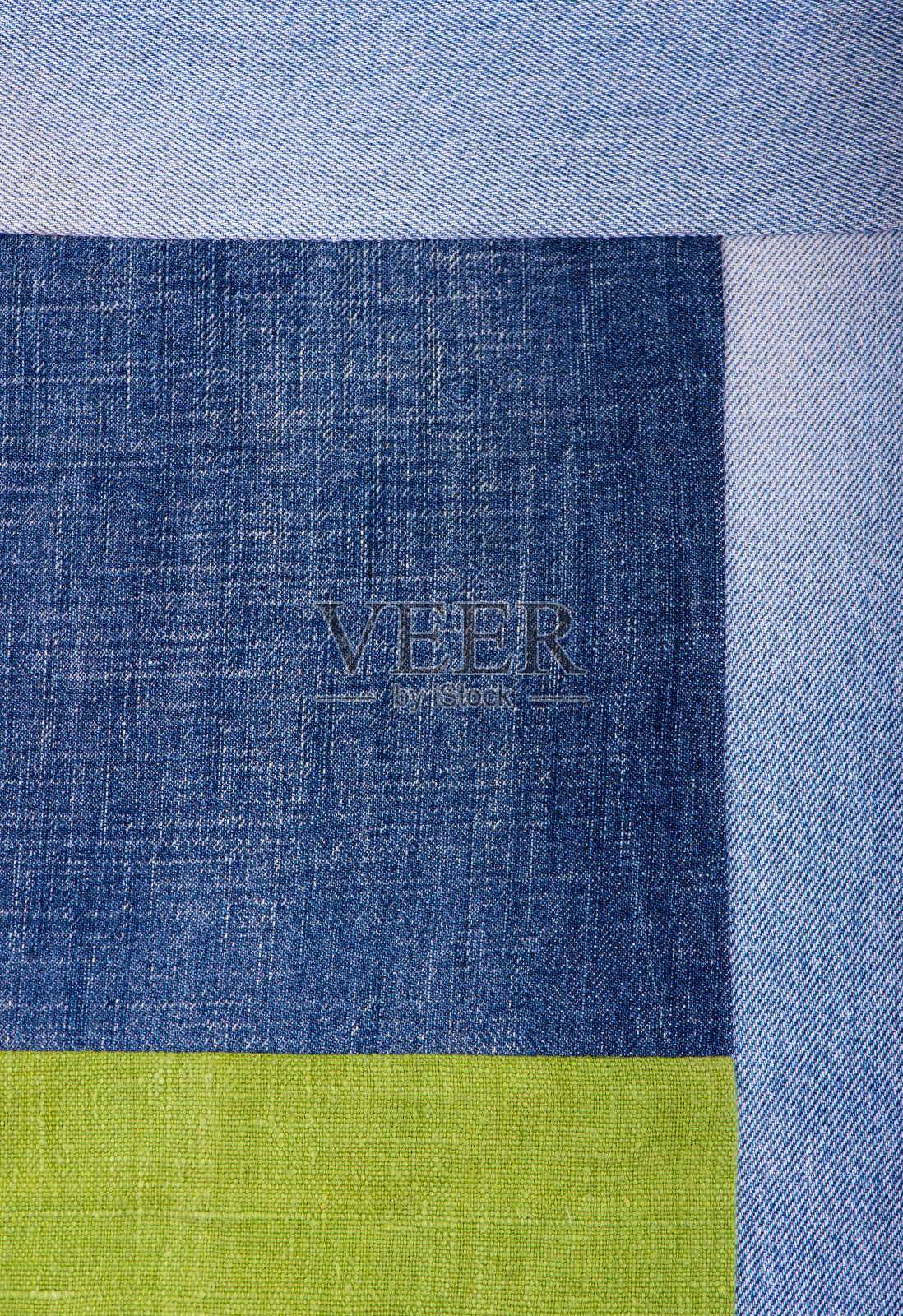 深蓝牛仔布牛仔布背景缝从补丁背景，详细的纹理与vignette照片摄影图片