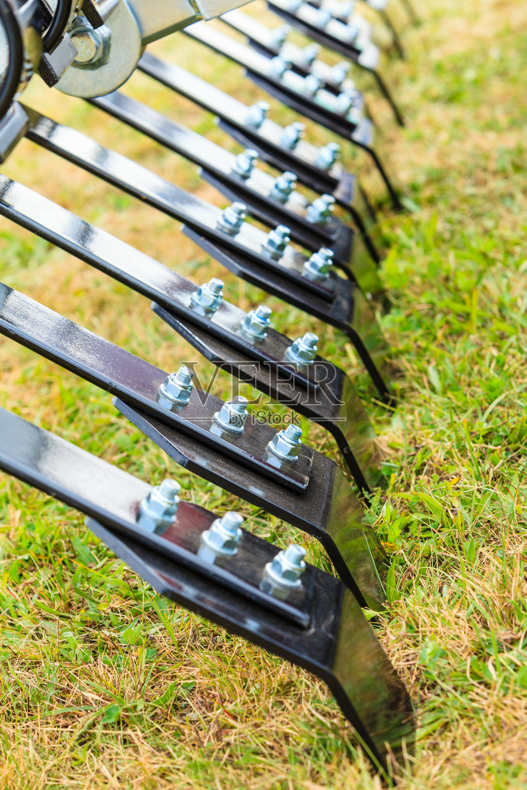 开膛机杆与螺丝的特写照片摄影图片