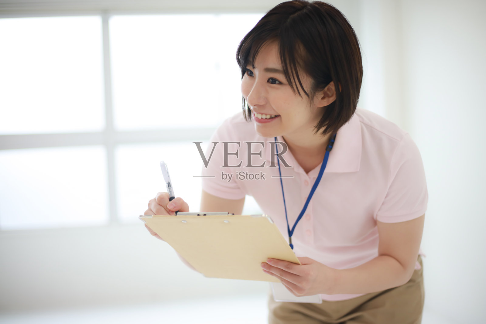 照顾者形象与活页夹照片摄影图片