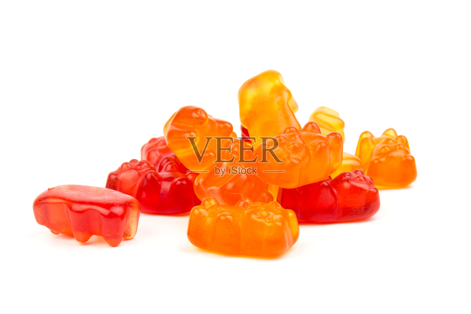 儿童维生素以熊的形式排列。很多五颜六色的儿童果冻糖果。照片摄影图片