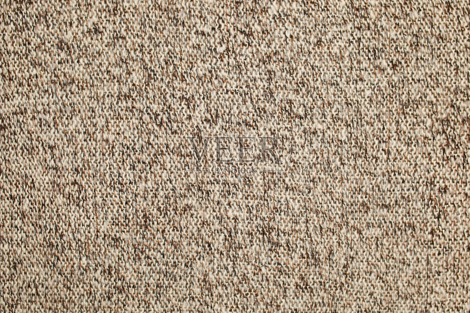 质地针织羊毛表面棕色米色白色。背景，纤维制成的墙纸。温暖的织物。照片摄影图片