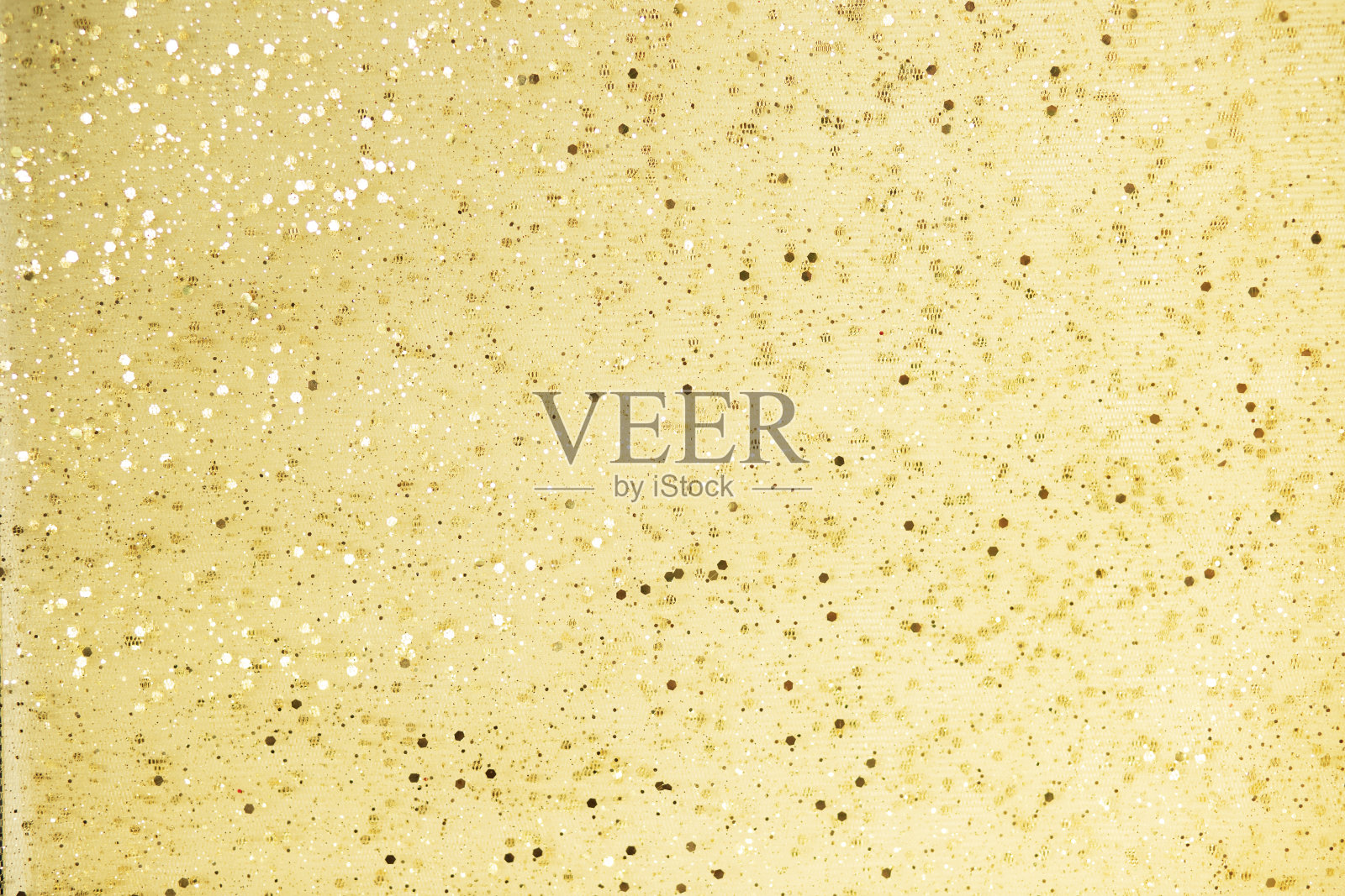 闪亮的金色香槟圣诞背景与明亮的莱茵石照片摄影图片