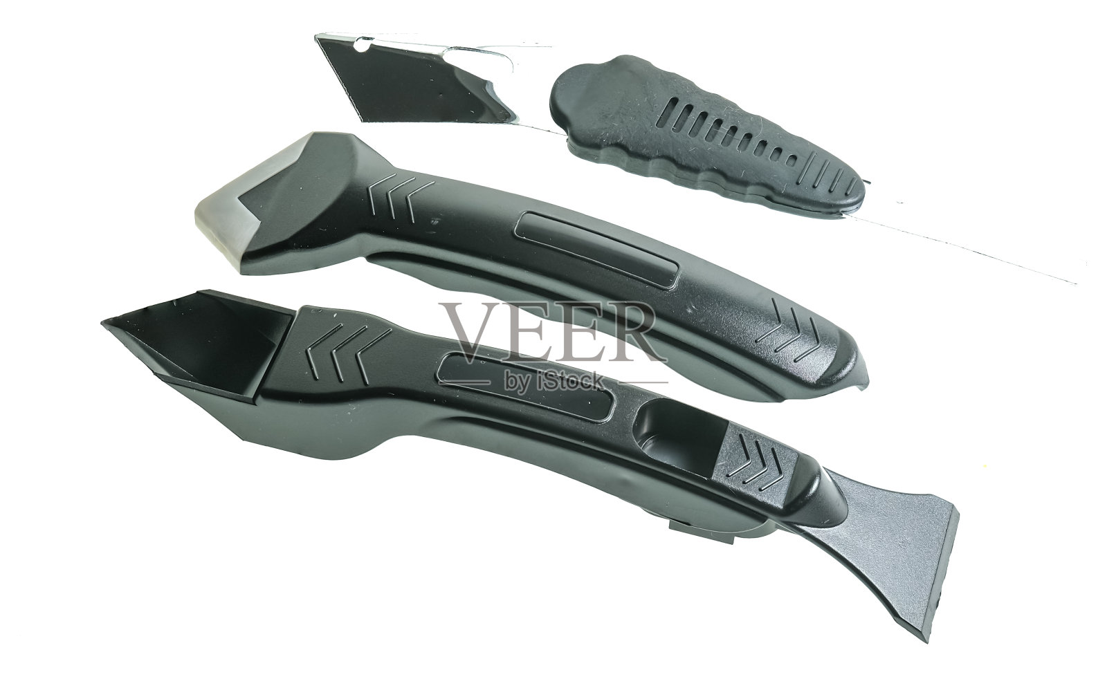 密封胶工具在一个纯白色的背景照片摄影图片