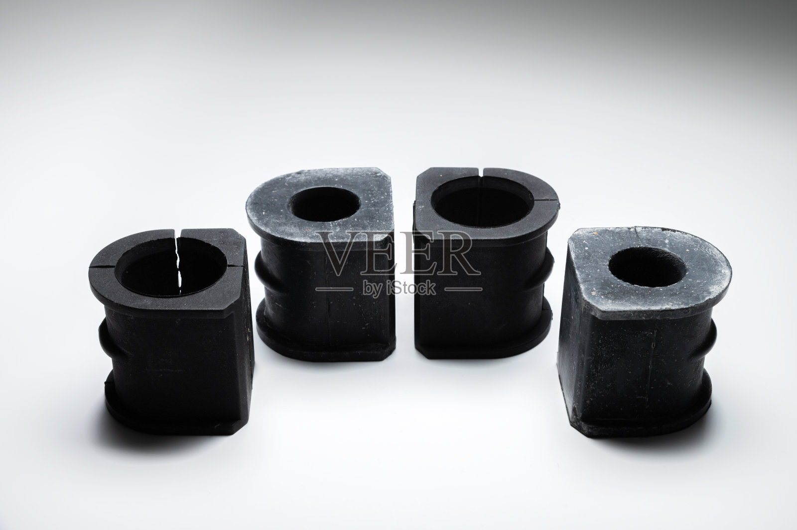 橡胶衬套防滚杆沉默块新对比光在黑色和白色的背景照片摄影图片