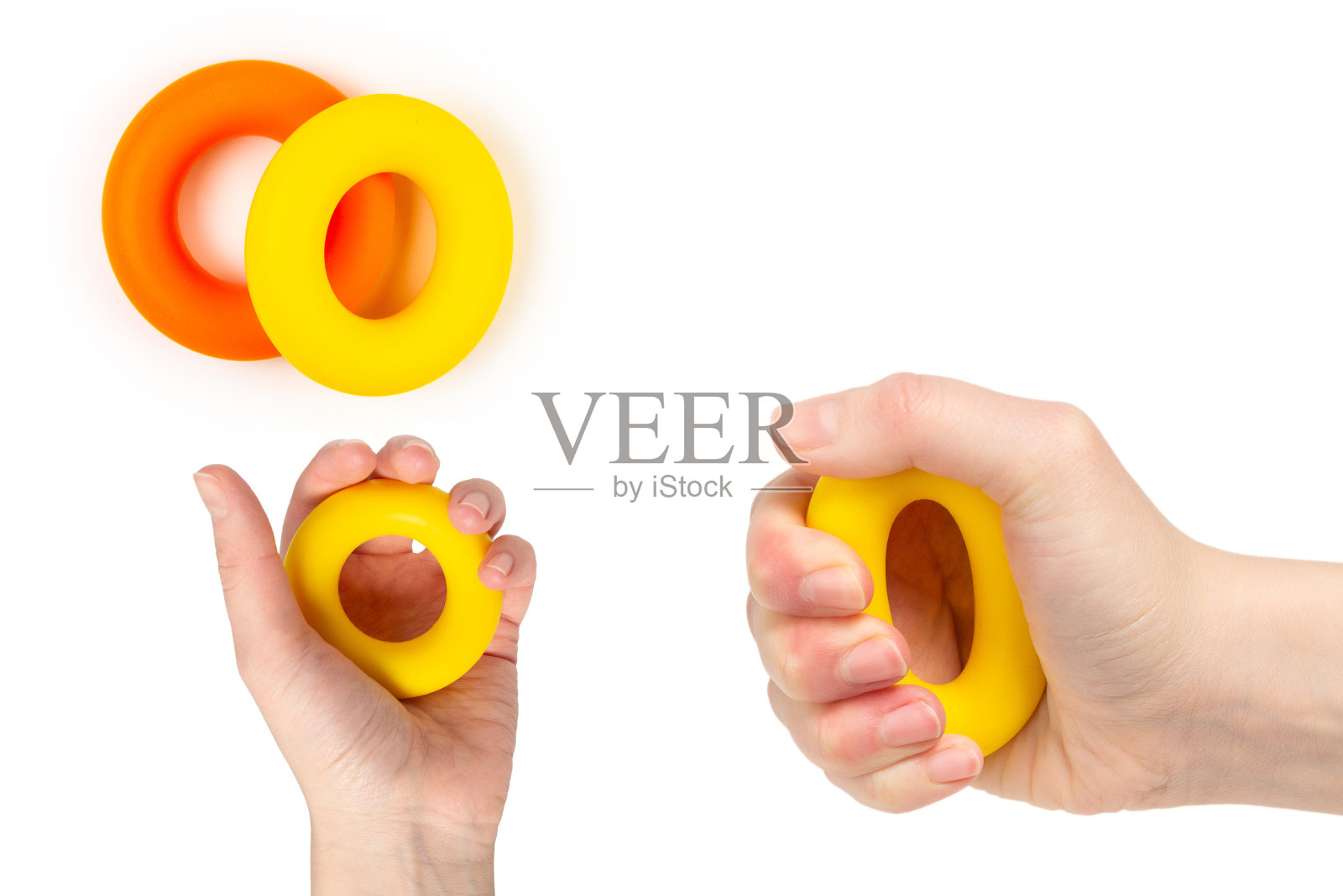 黄色和橙色扩展器孤立在白色背景上。照片摄影图片