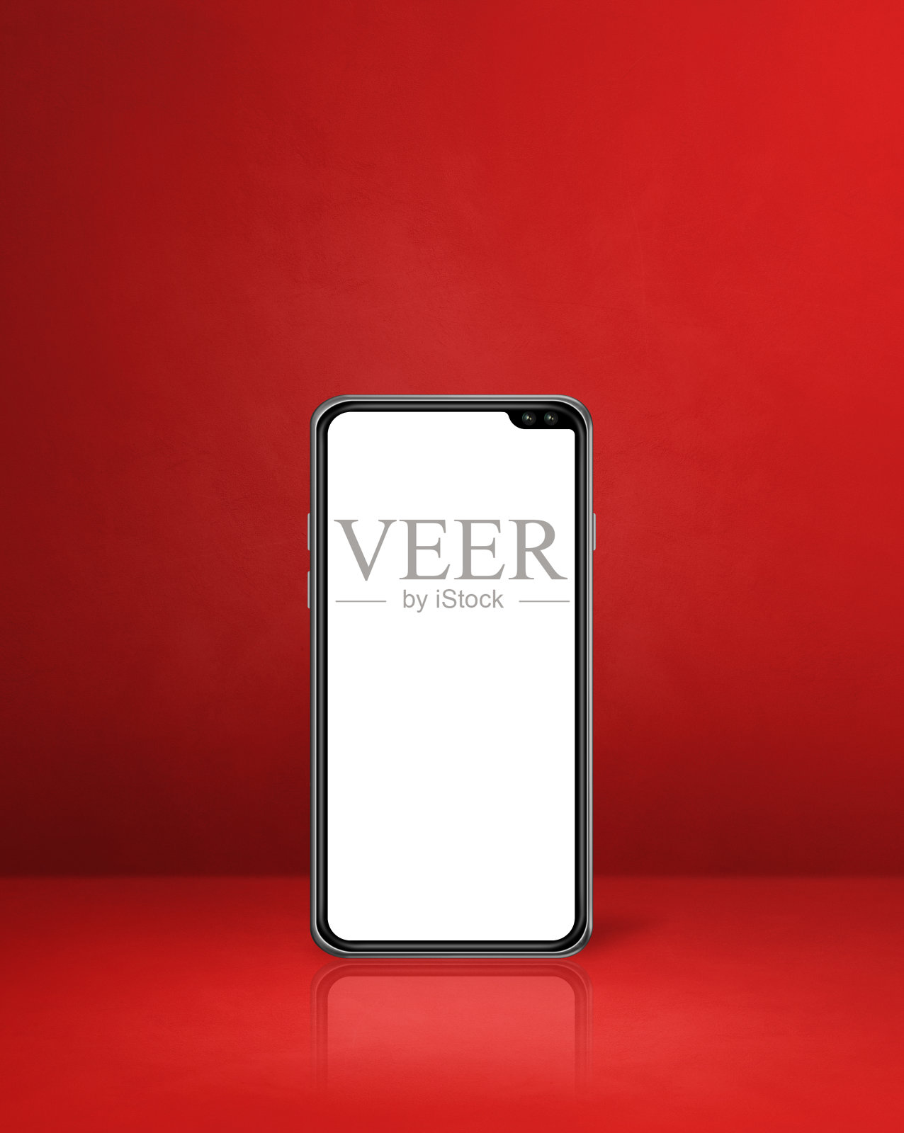 手机在红色办公桌背景照片摄影图片