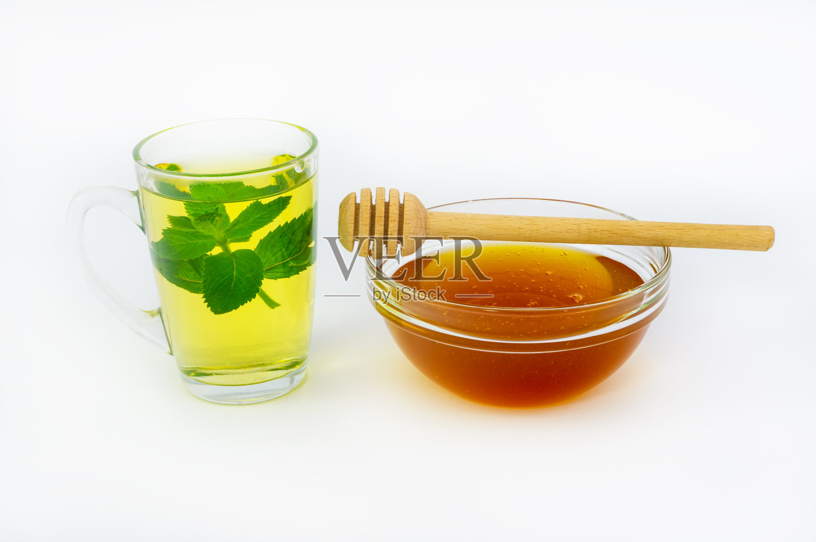 梅利莎和蜂蜜一起喝茶照片摄影图片