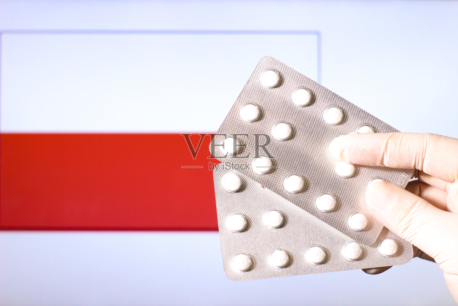 手握外科手套握丸起泡照片摄影图片