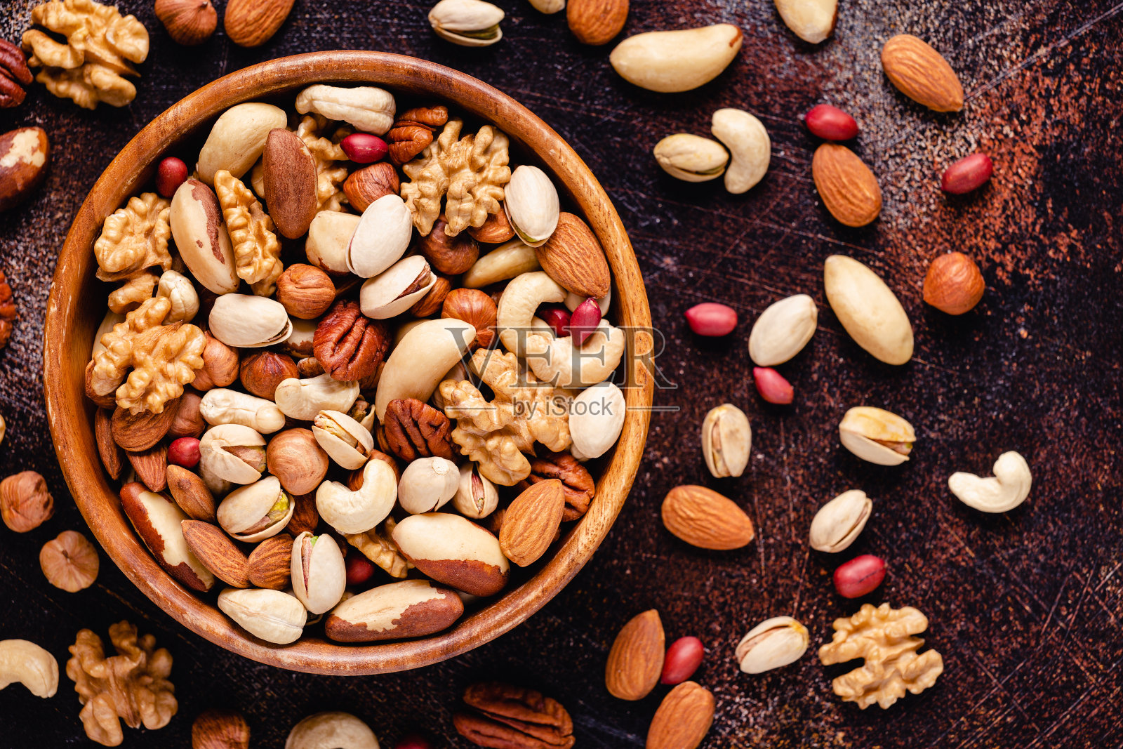 各种坚果木碗照片摄影图片