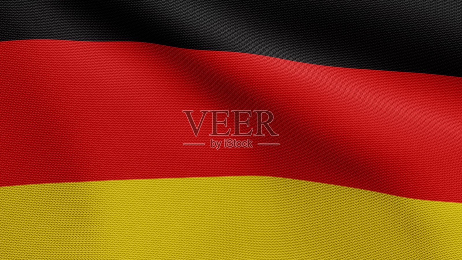 迎风飘扬的德国国旗。近处的德国旗帜吹拂，丝质柔软。照片摄影图片