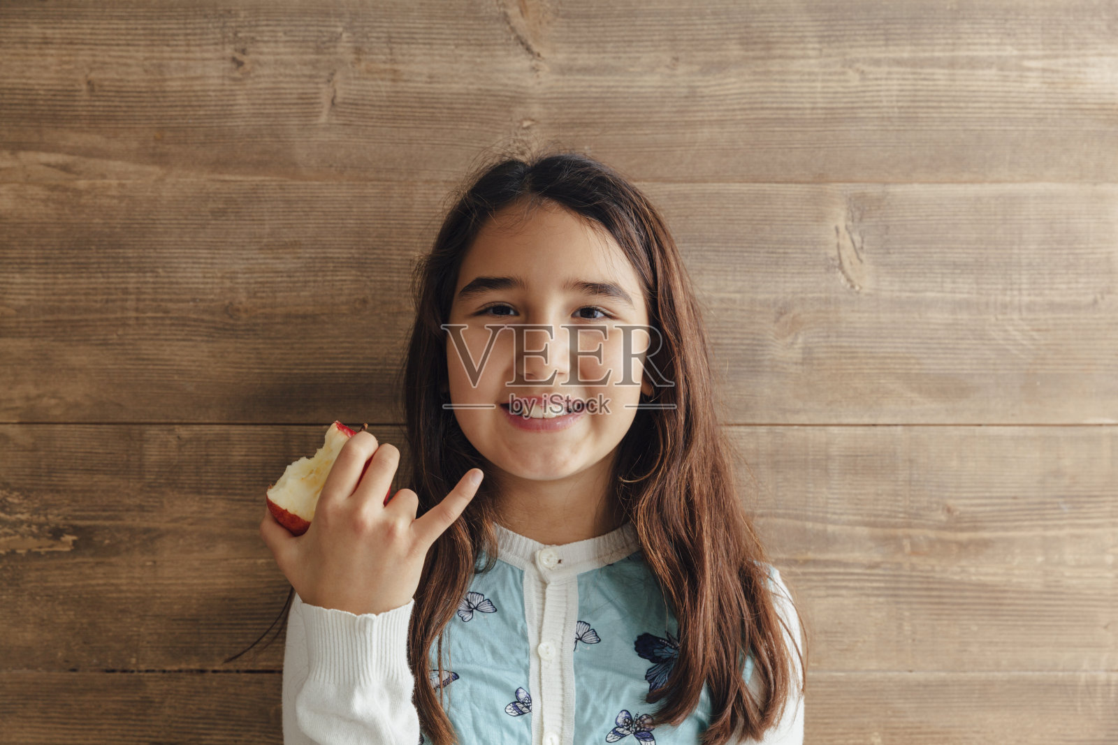 咬苹果照片摄影图片