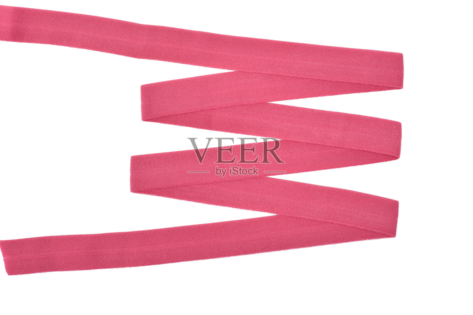 内衣的松紧带为衣服和胸罩以白色为背景，之字形排列。孤立。照片摄影图片